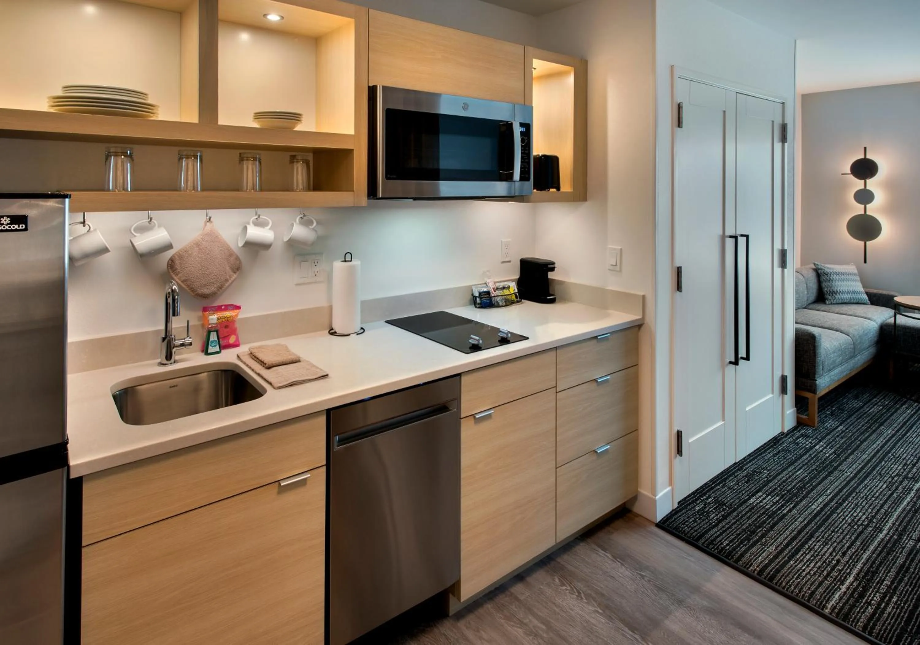 Kitchen or kitchenette, Bed in TownePlace Suites Portland Airport ME