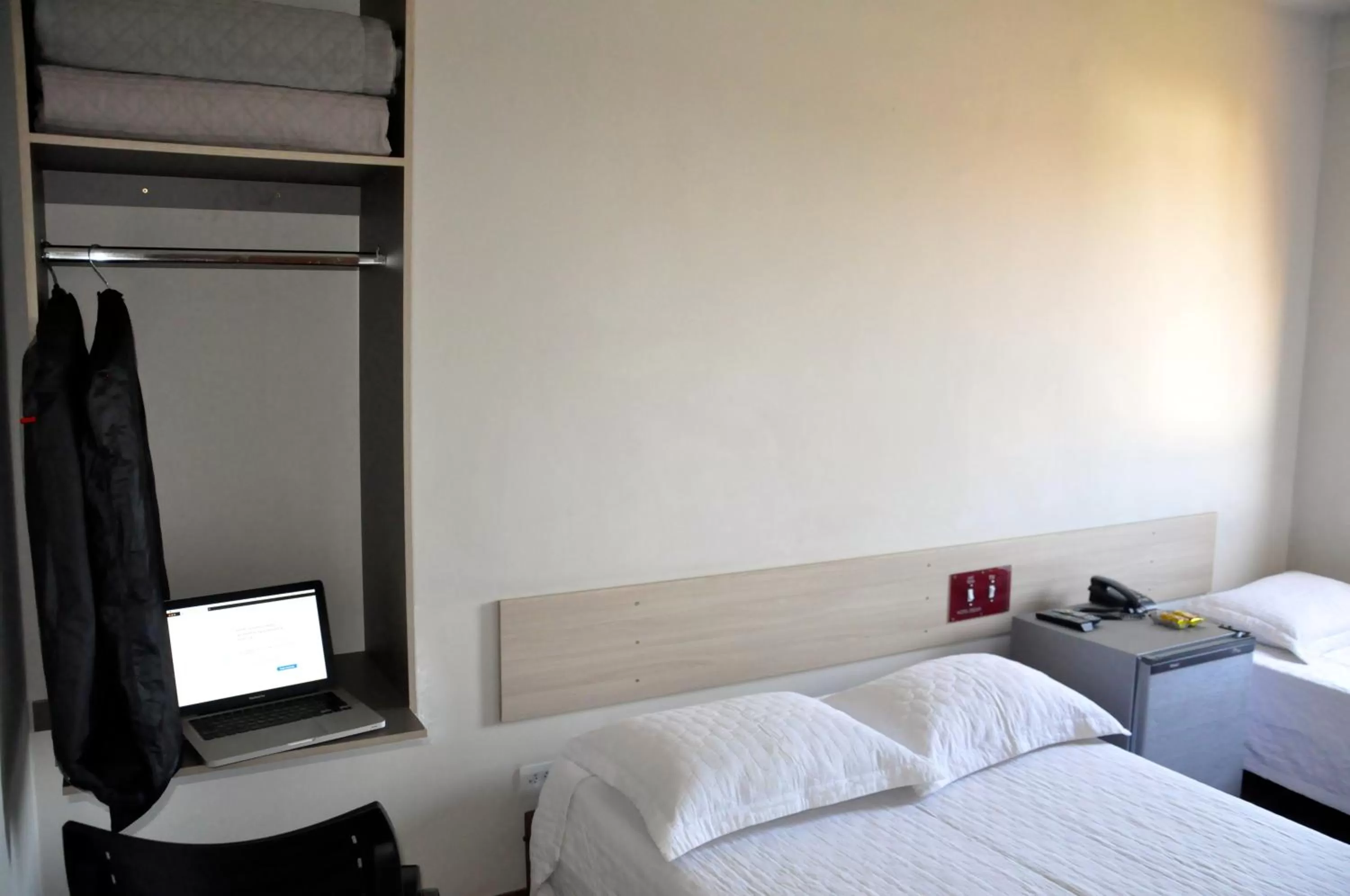 Bed in Hotel Caçula