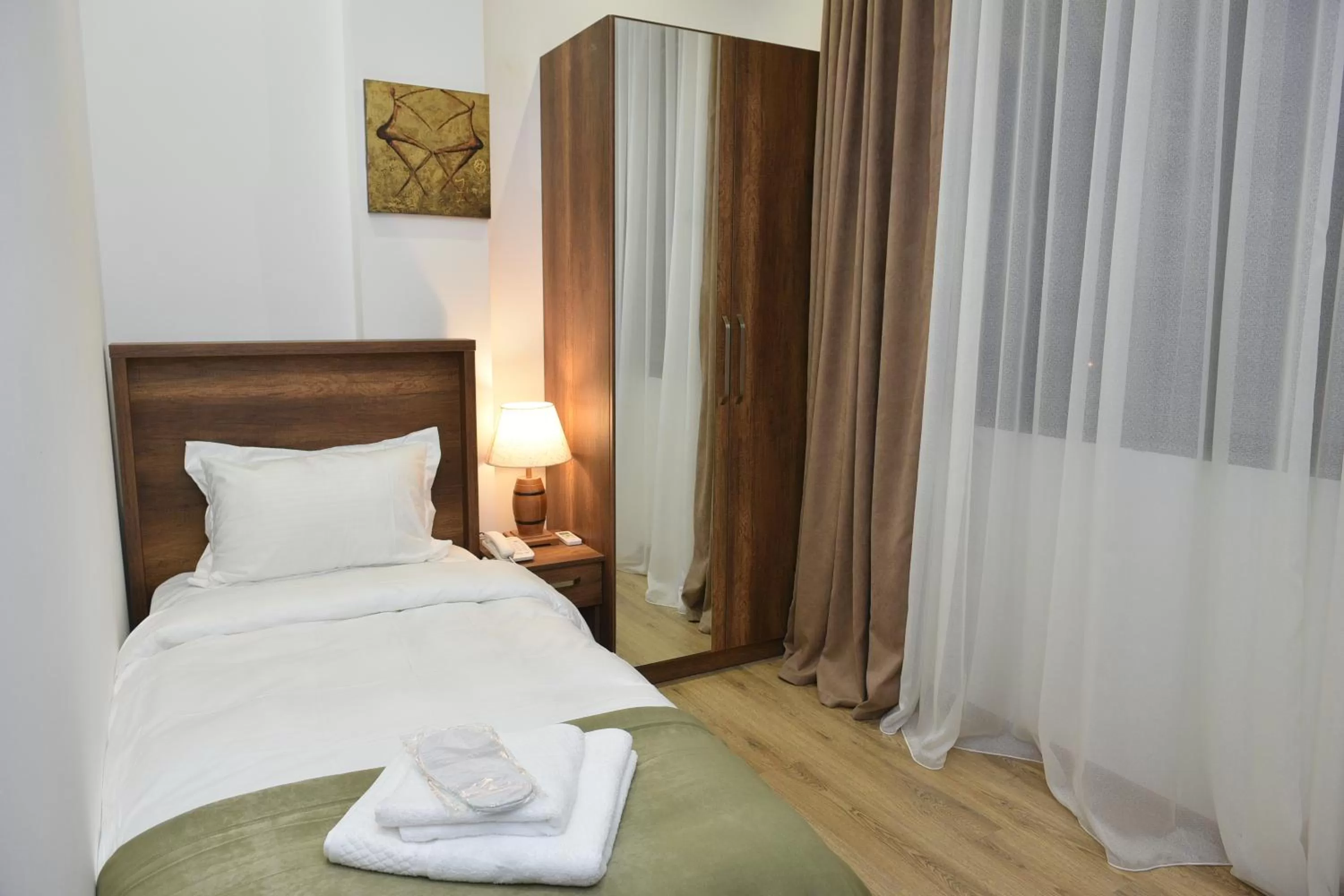 Bed in Hotel King Tom