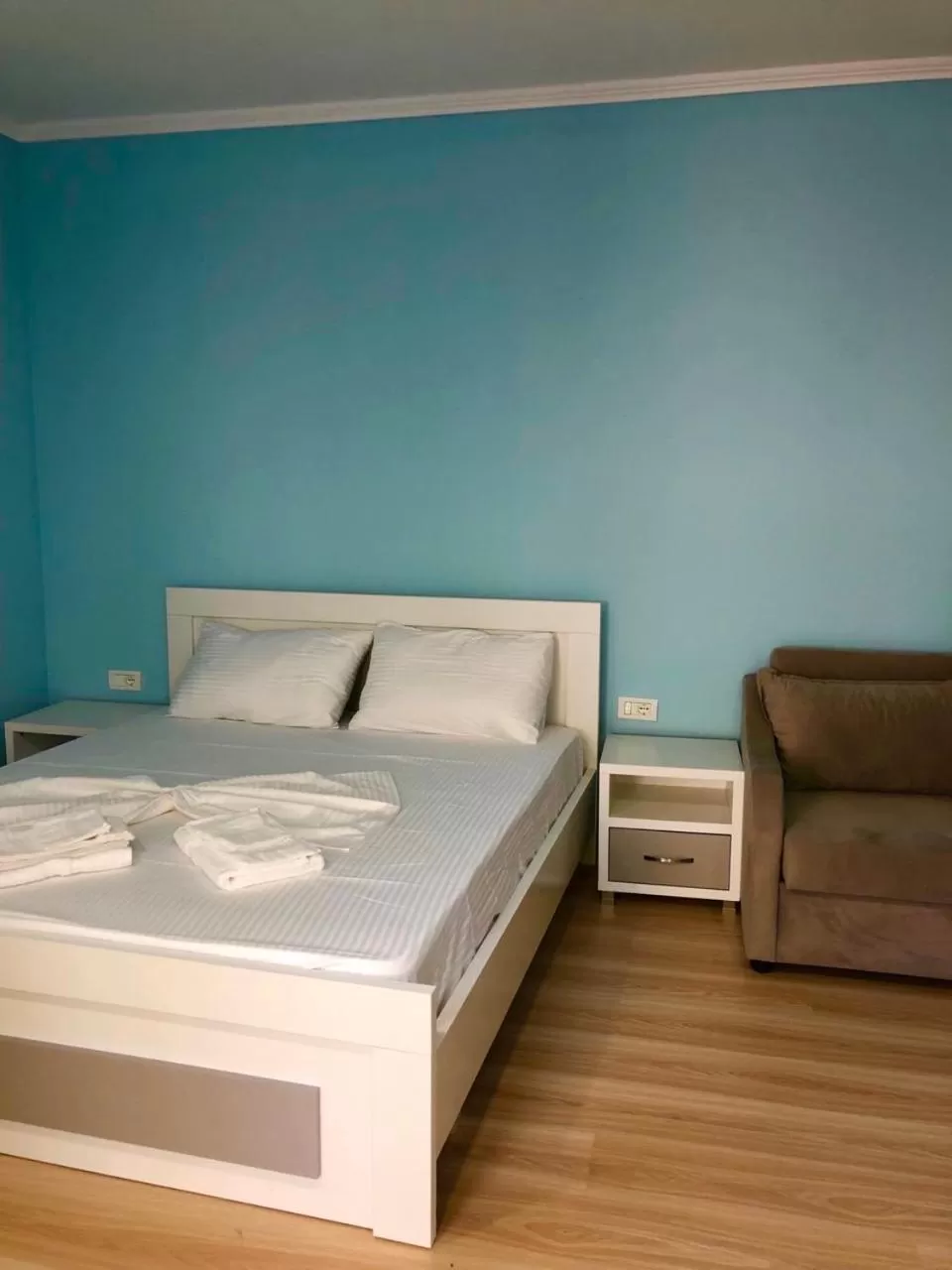 Bed in Aphrodite Garden Rooms & Apartment