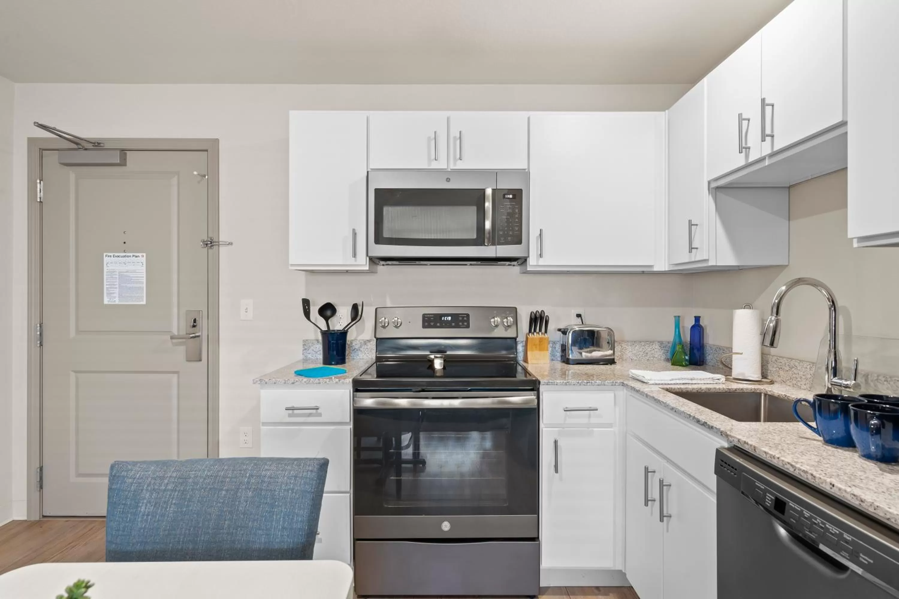 kitchen in WaterWalk Extended Stay by Wyndham Kansas City - Overland Pk