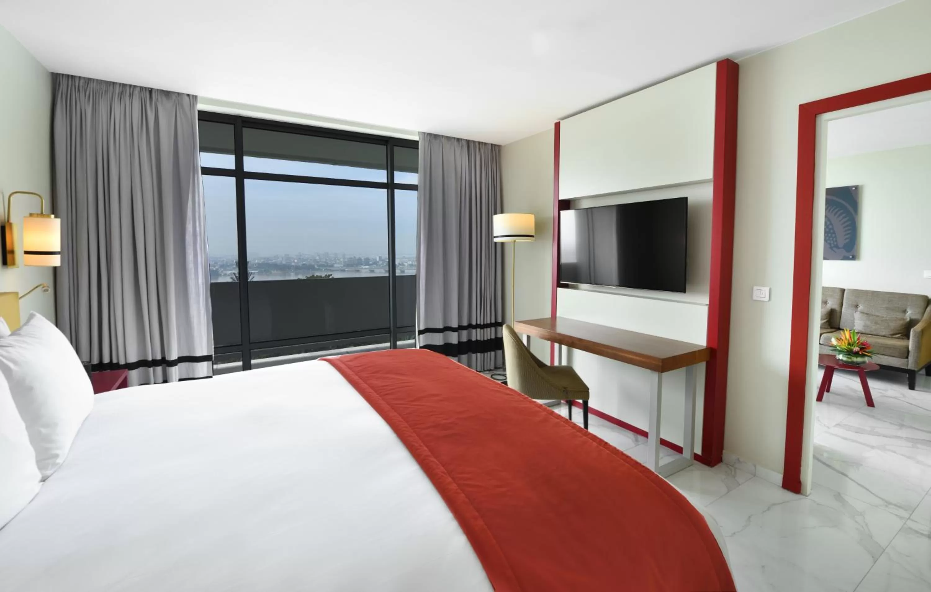 Communal lounge/ TV room in Sofitel Abidjan Hotel Ivoire