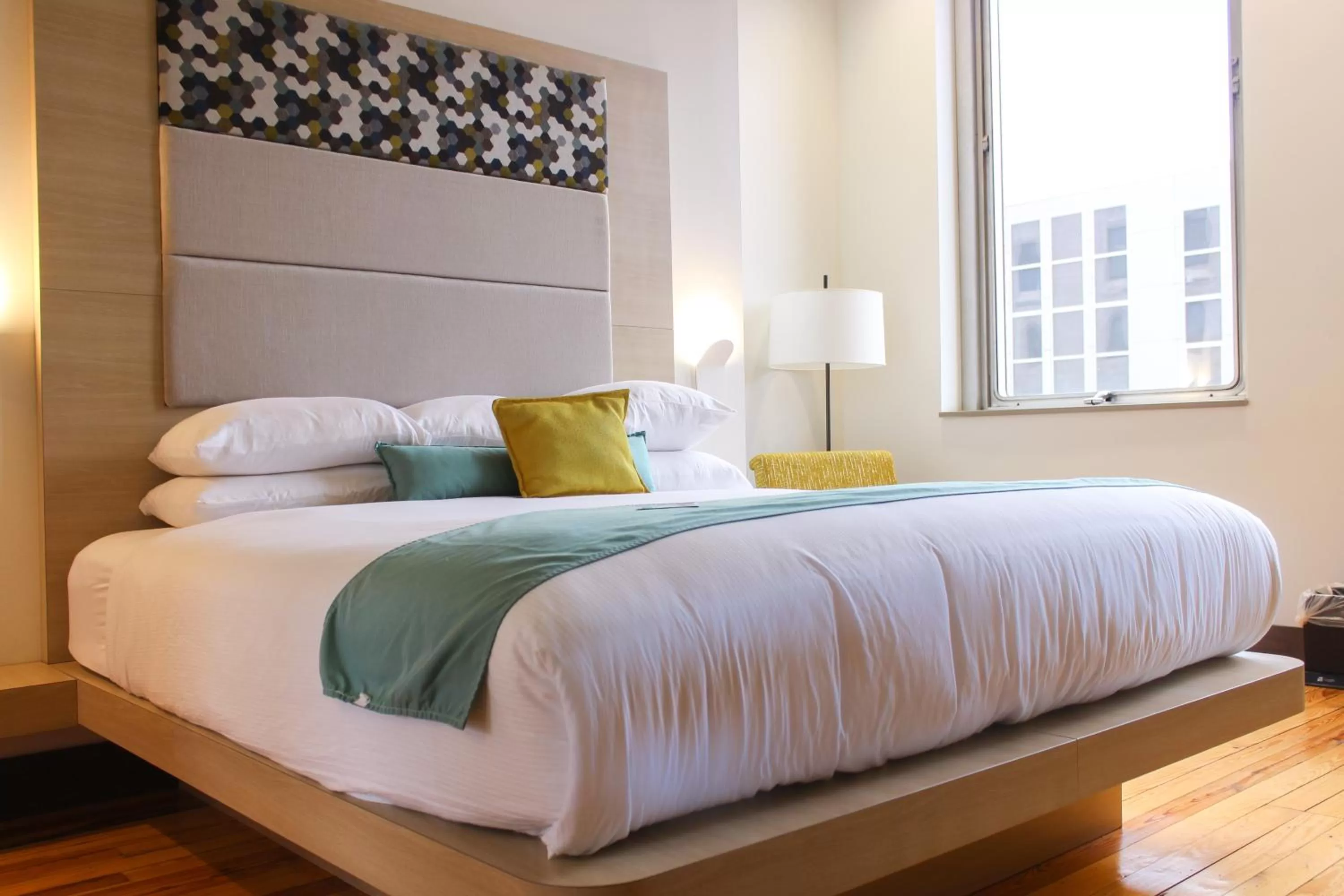 Bed in CityFlatsHotel - Grand Rapids, an Ascend Collection Hotel