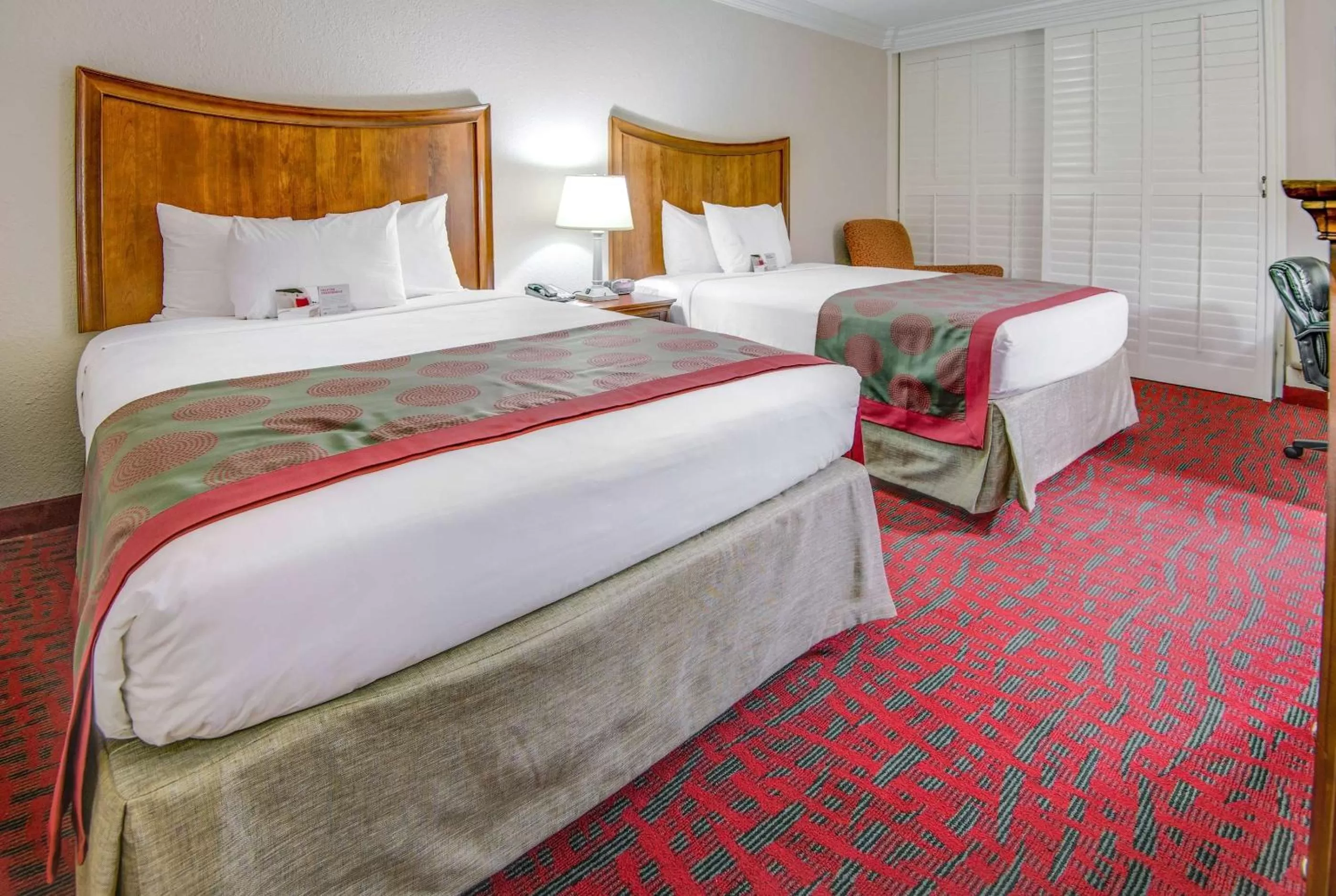 Photo of the whole room, Bed in Ramada by Wyndham Metairie New Orleans Airport
