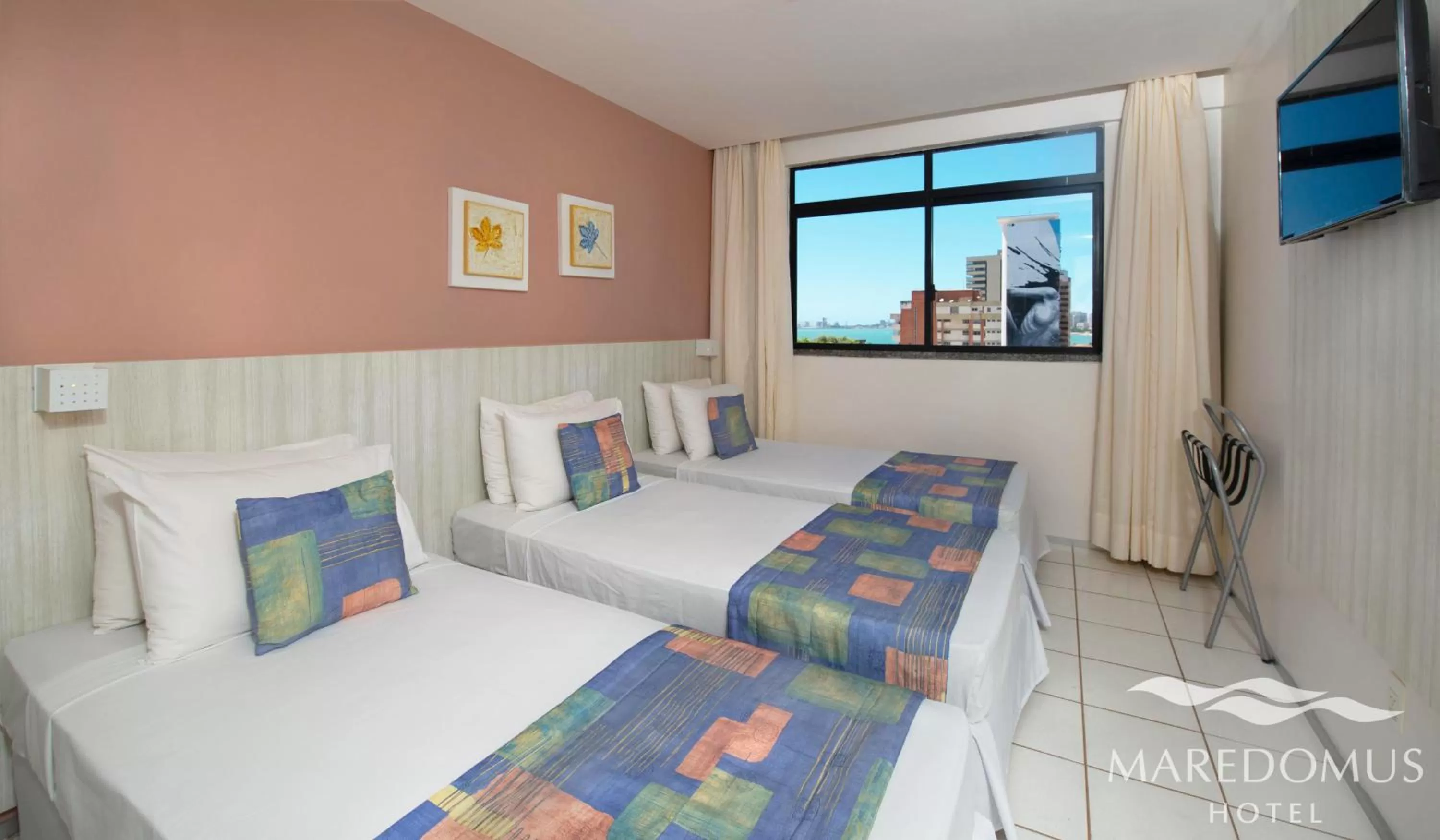 Bed in Maredomus Hotel