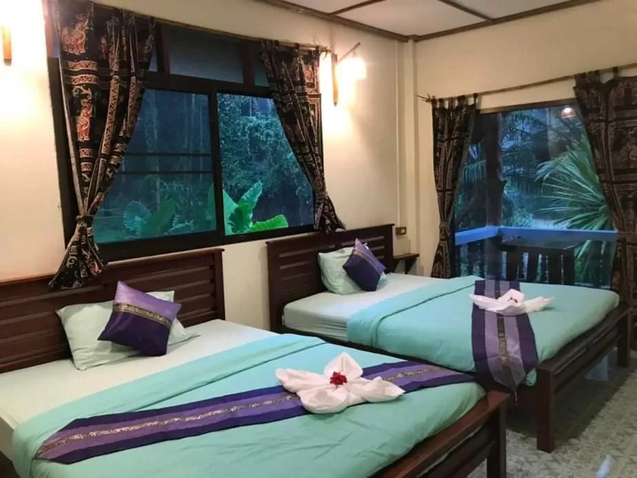 Photo of the whole room, Bed in Khao Sok River & Jungle Resort