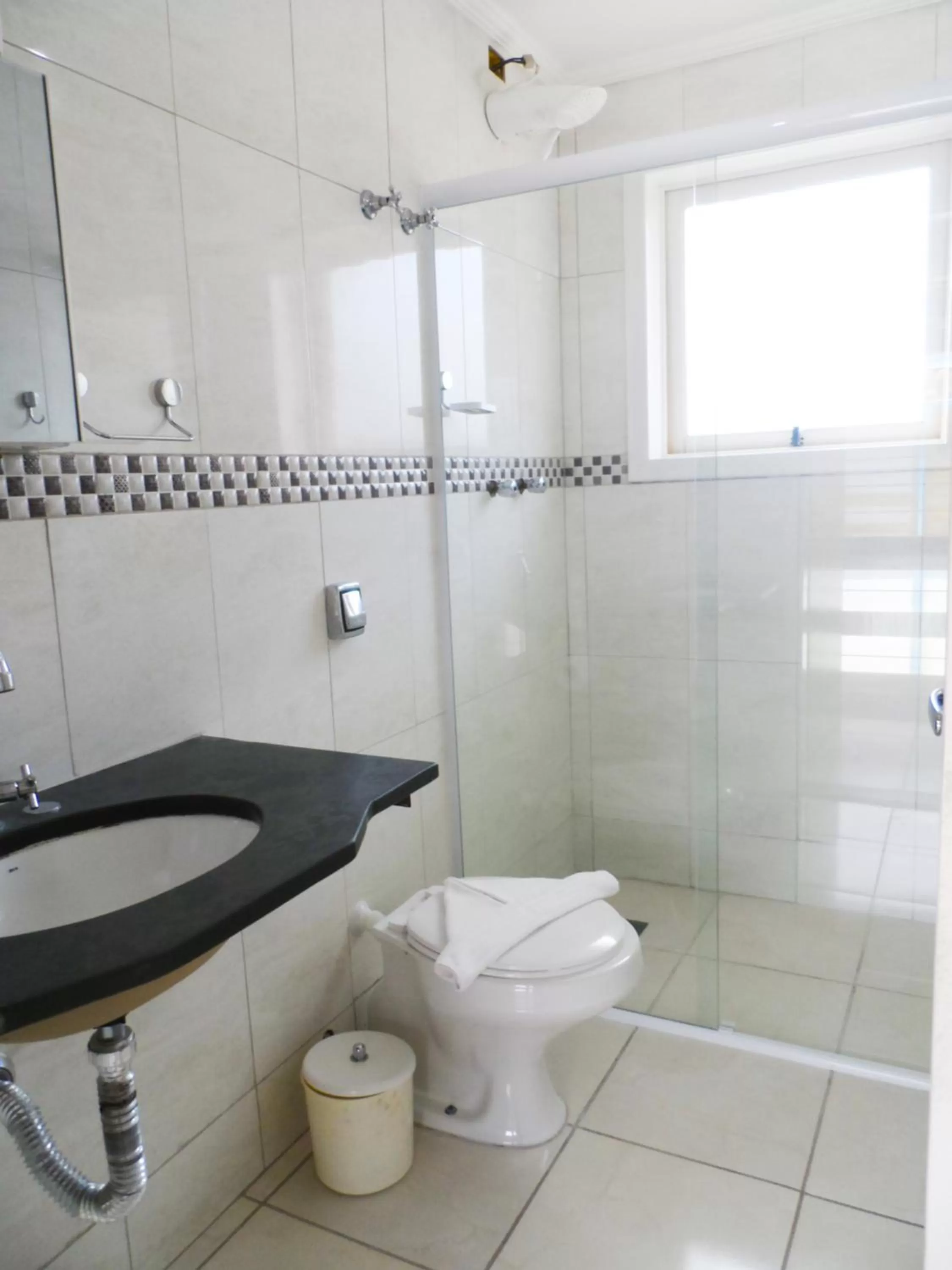 Bathroom in Hotel e Pousada Pouso54