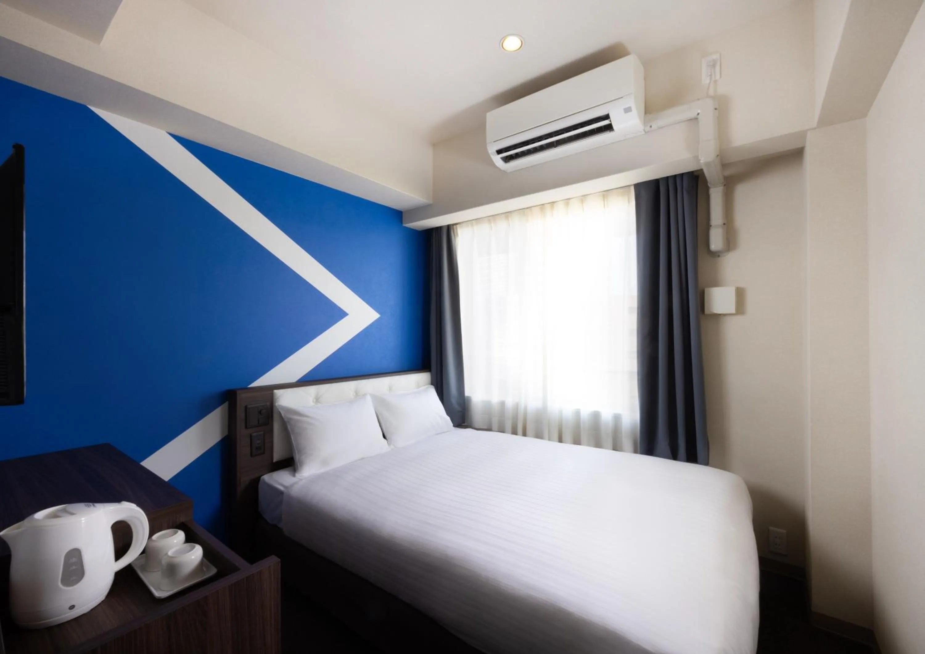 Photo of the whole room, Bed in ibis Budget Osaka Umeda