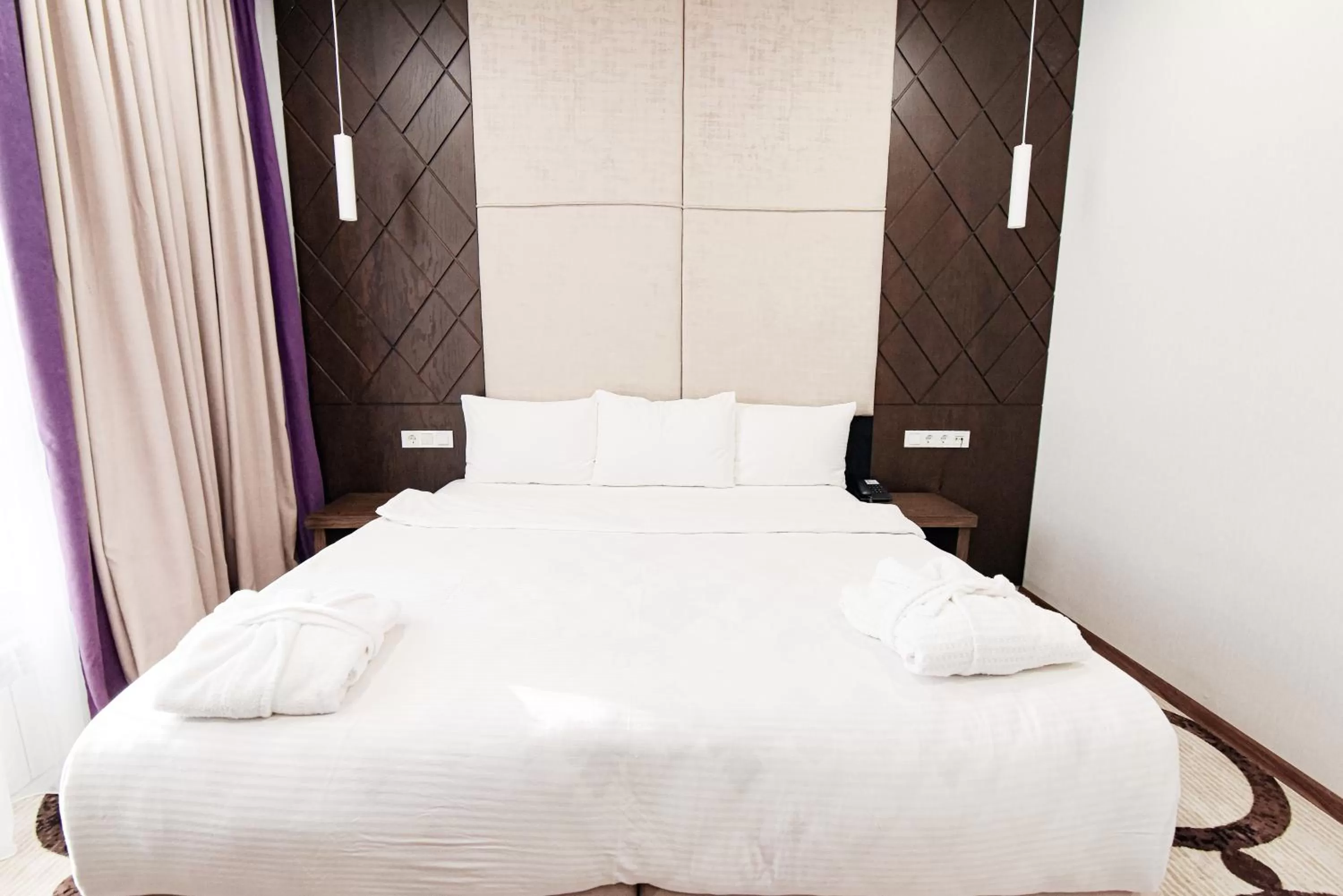 Bed in East Palace Hotel