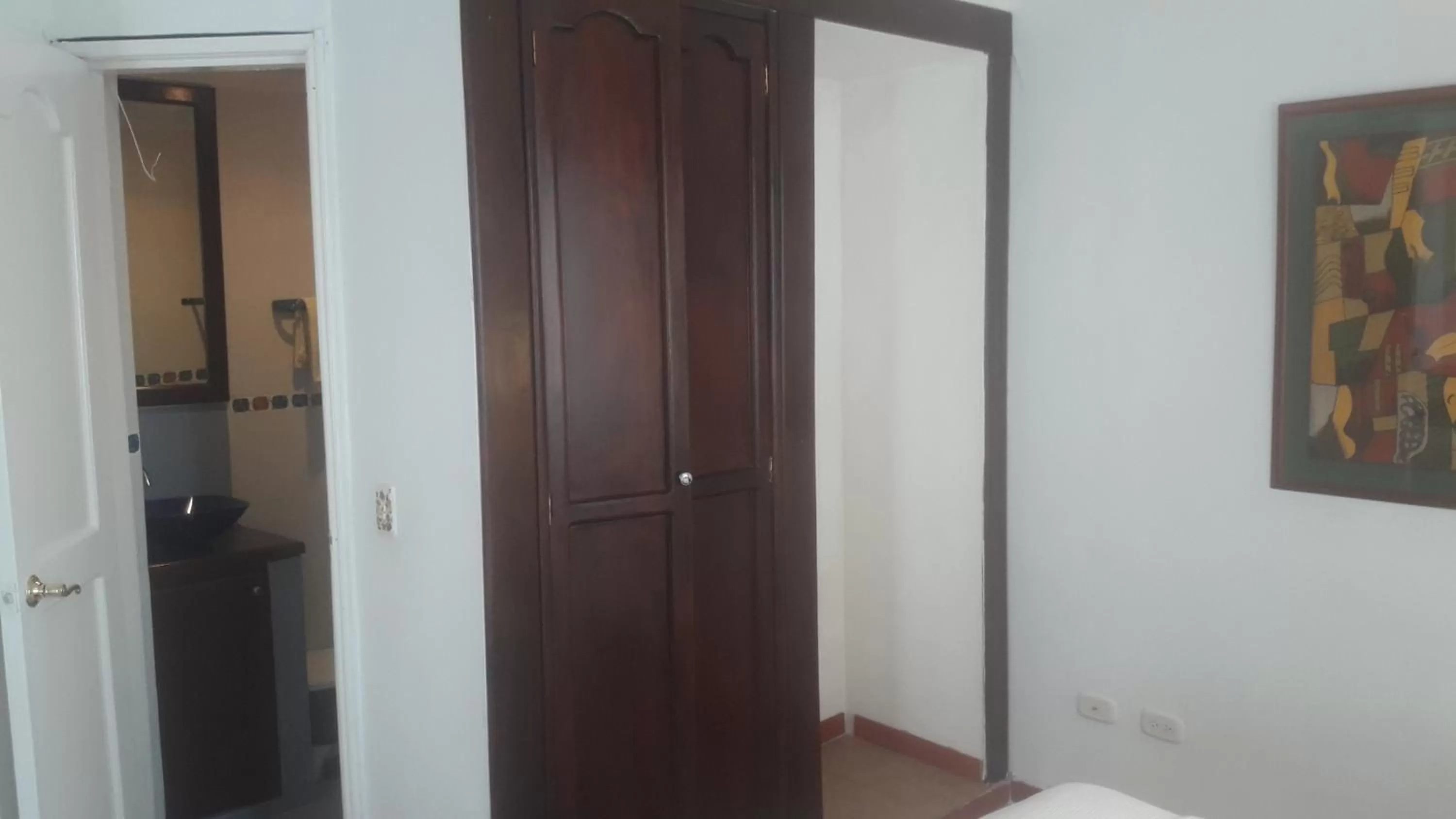 Bedroom, TV/Entertainment Center in Casa hotel Mi Huila