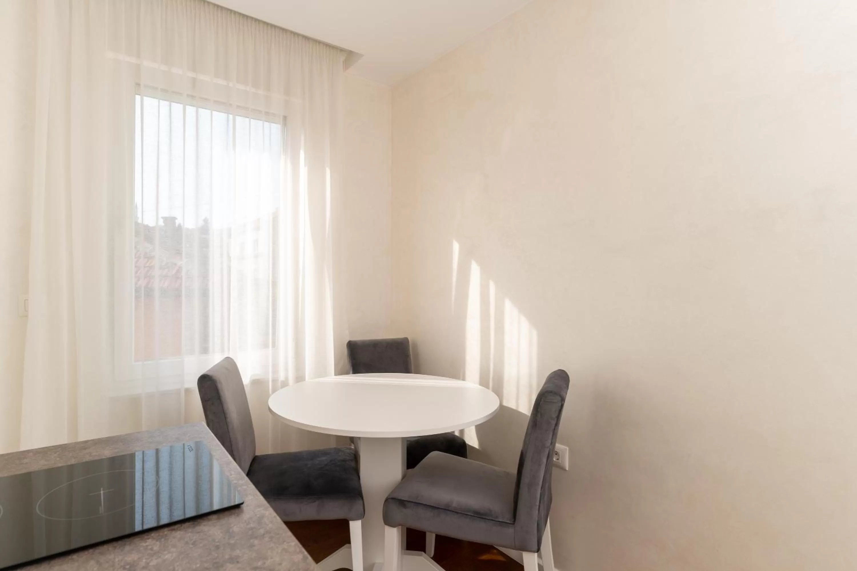 Dining area in Ornament Hotel and Apartments