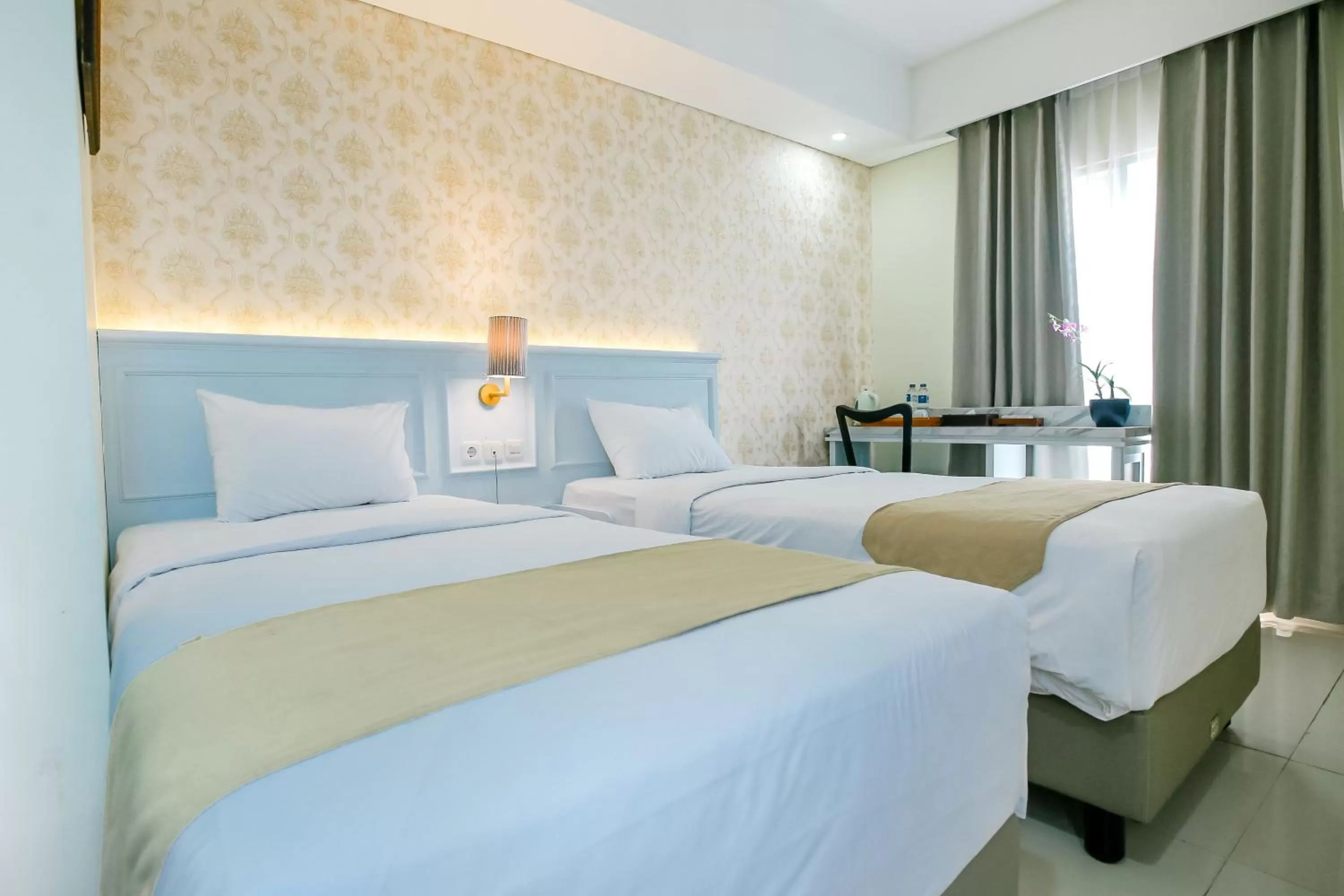 Bed in The Cube Hotel Malioboro, Azana Hotels Collection