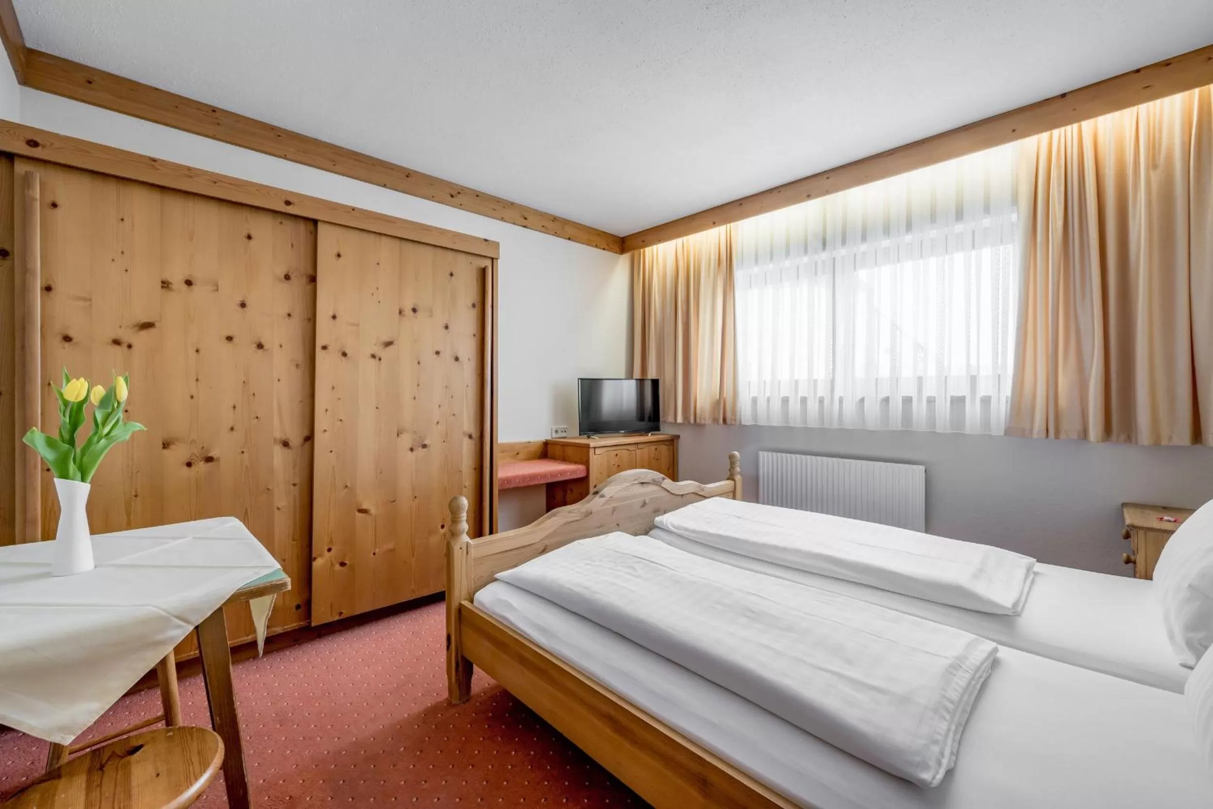 Photo of the whole room, Bed in Gasthof Schroll