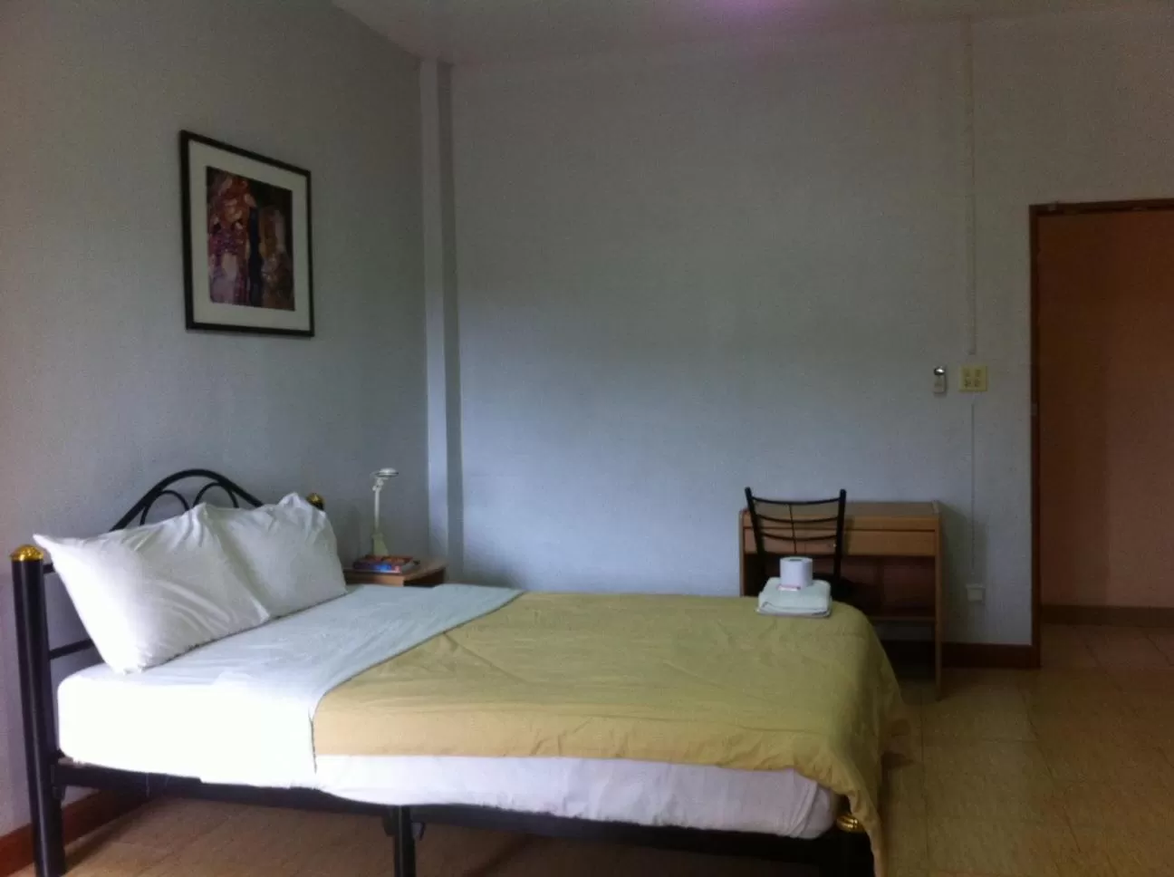 Bed in Pikul Apartment Hotel