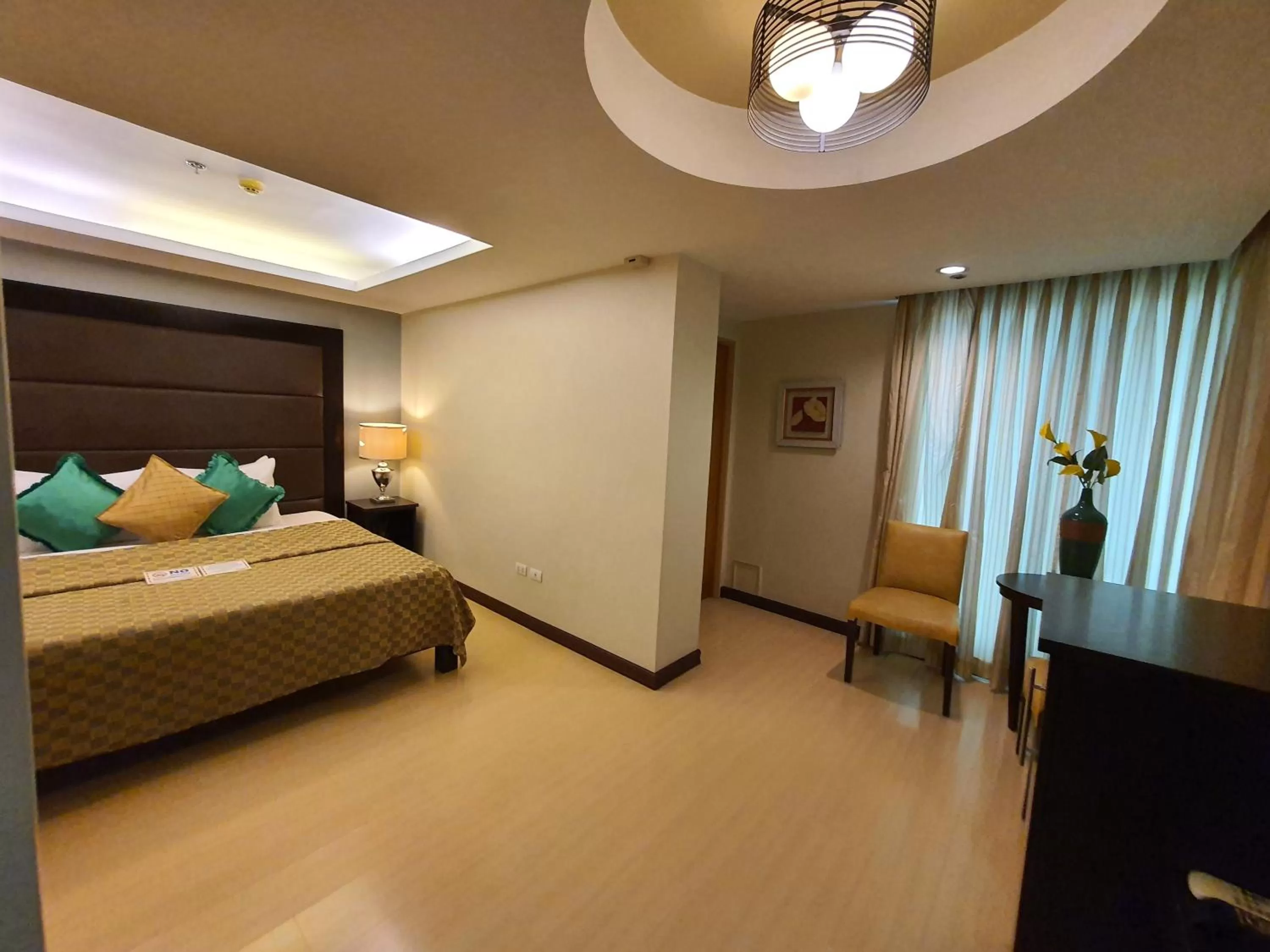 Bed in Festive Hotel Makati