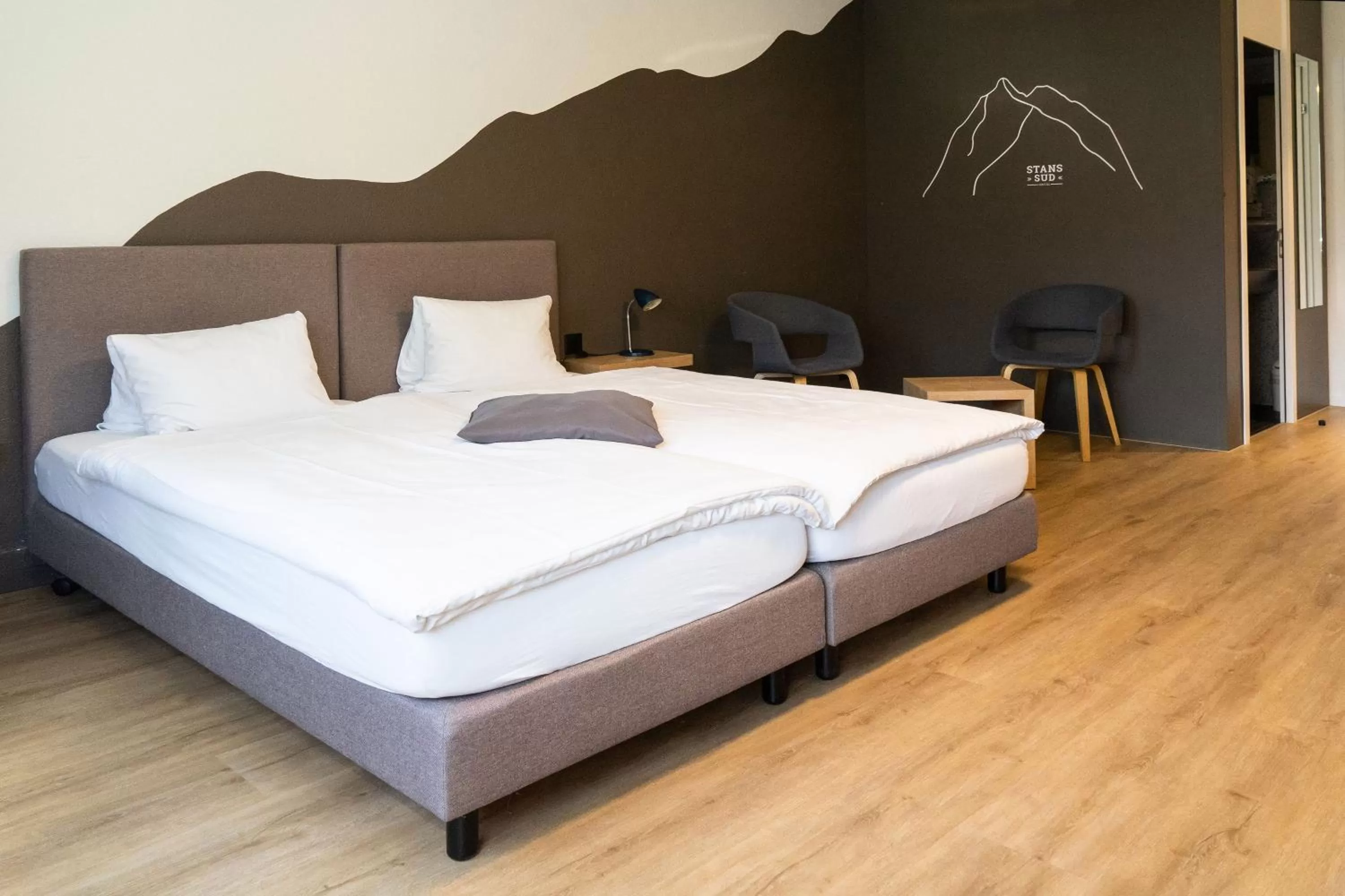 Bed in Tailormade Hotel STANS SÜD