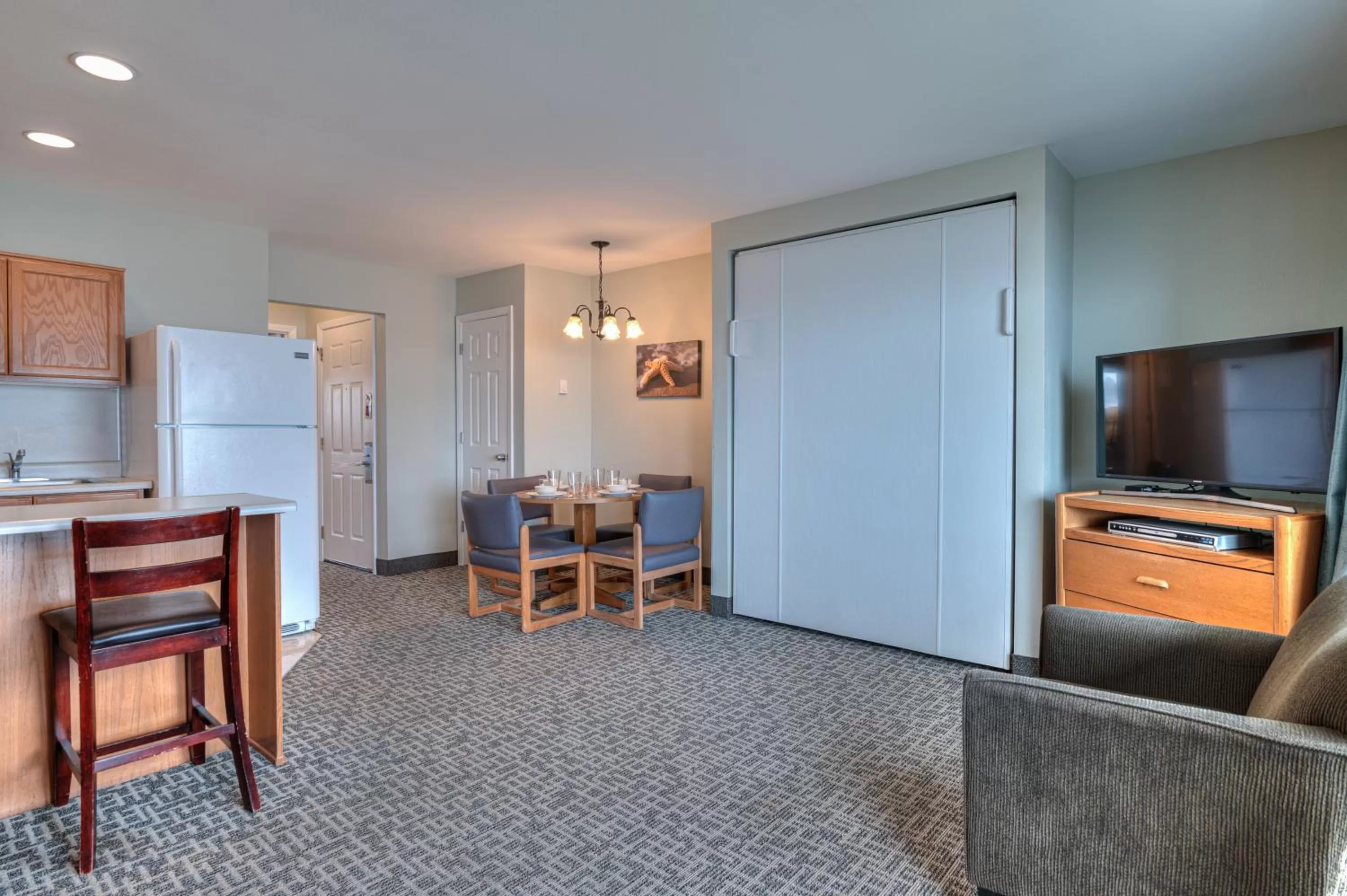 Bed, TV/Entertainment Center in D Sands Rentals