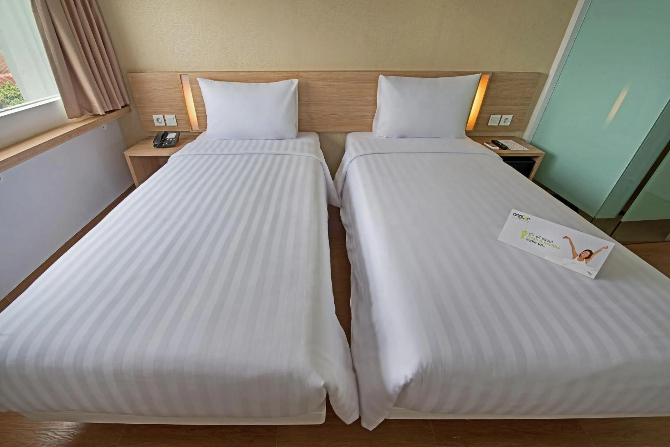 Bed in Whiz Prime Hotel Pajajaran Bogor