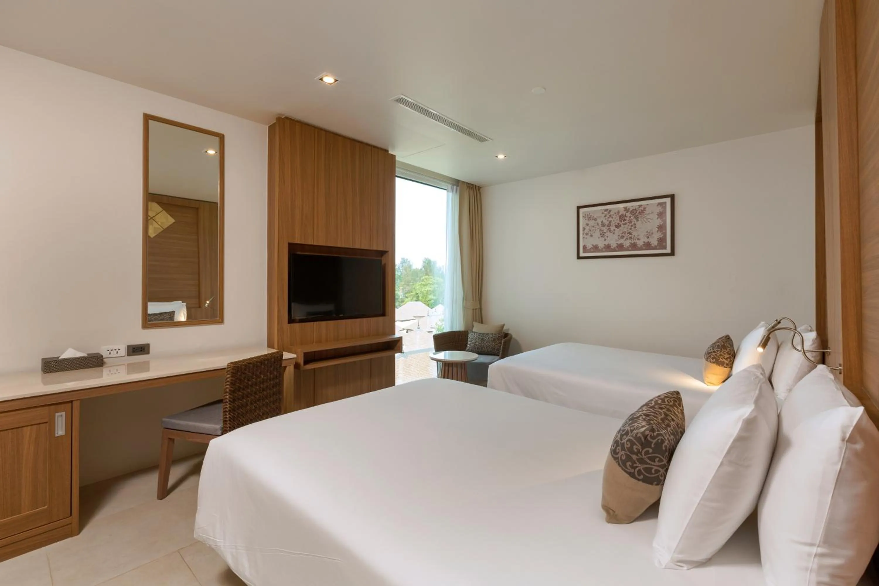 Bed in Splash Beach Resort Phuket Family-Friendly Water Park Resort Near Phuket Airport
