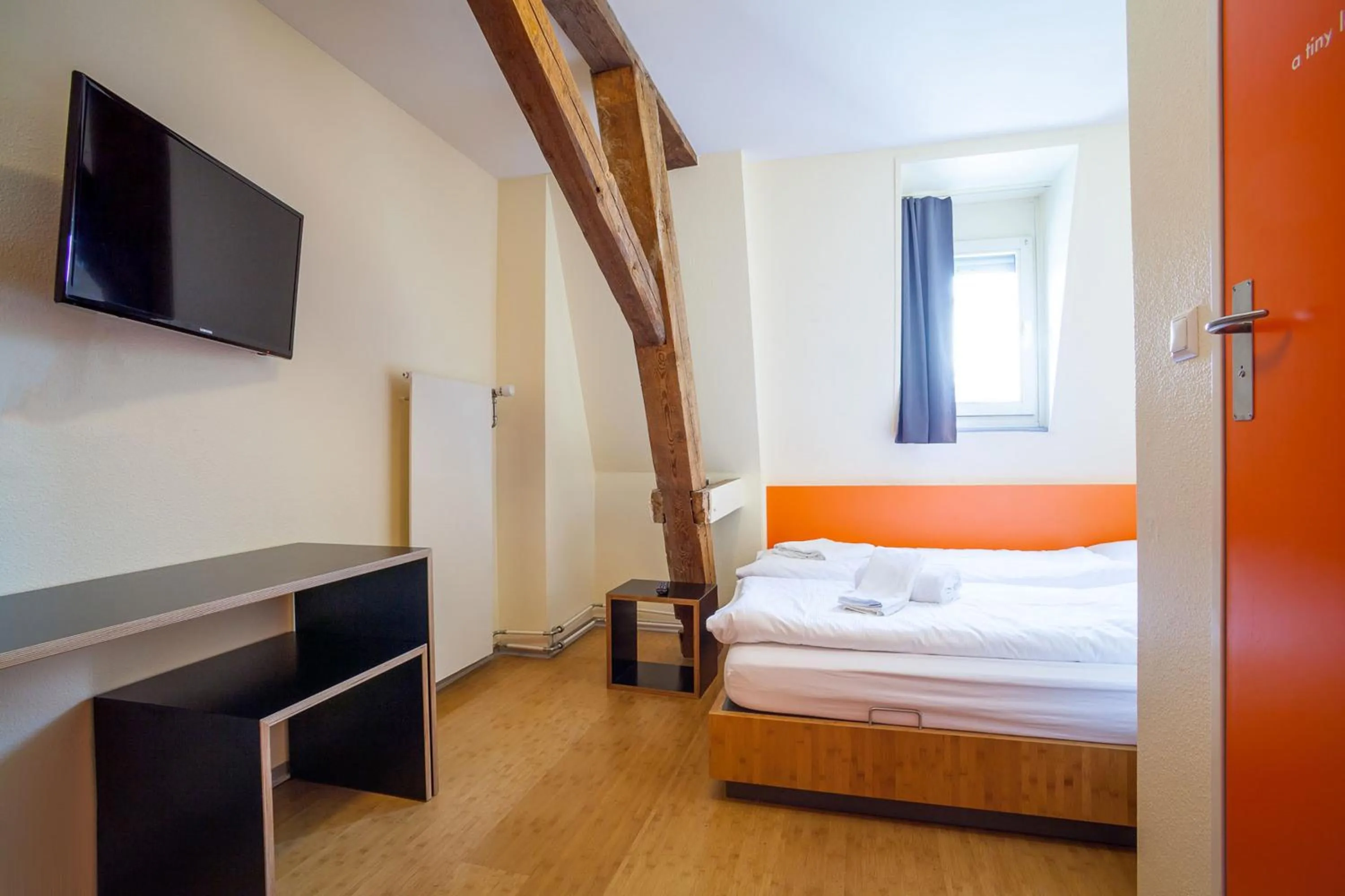 Photo of the whole room, Bed in easyHotel Basel - self service and self check-in