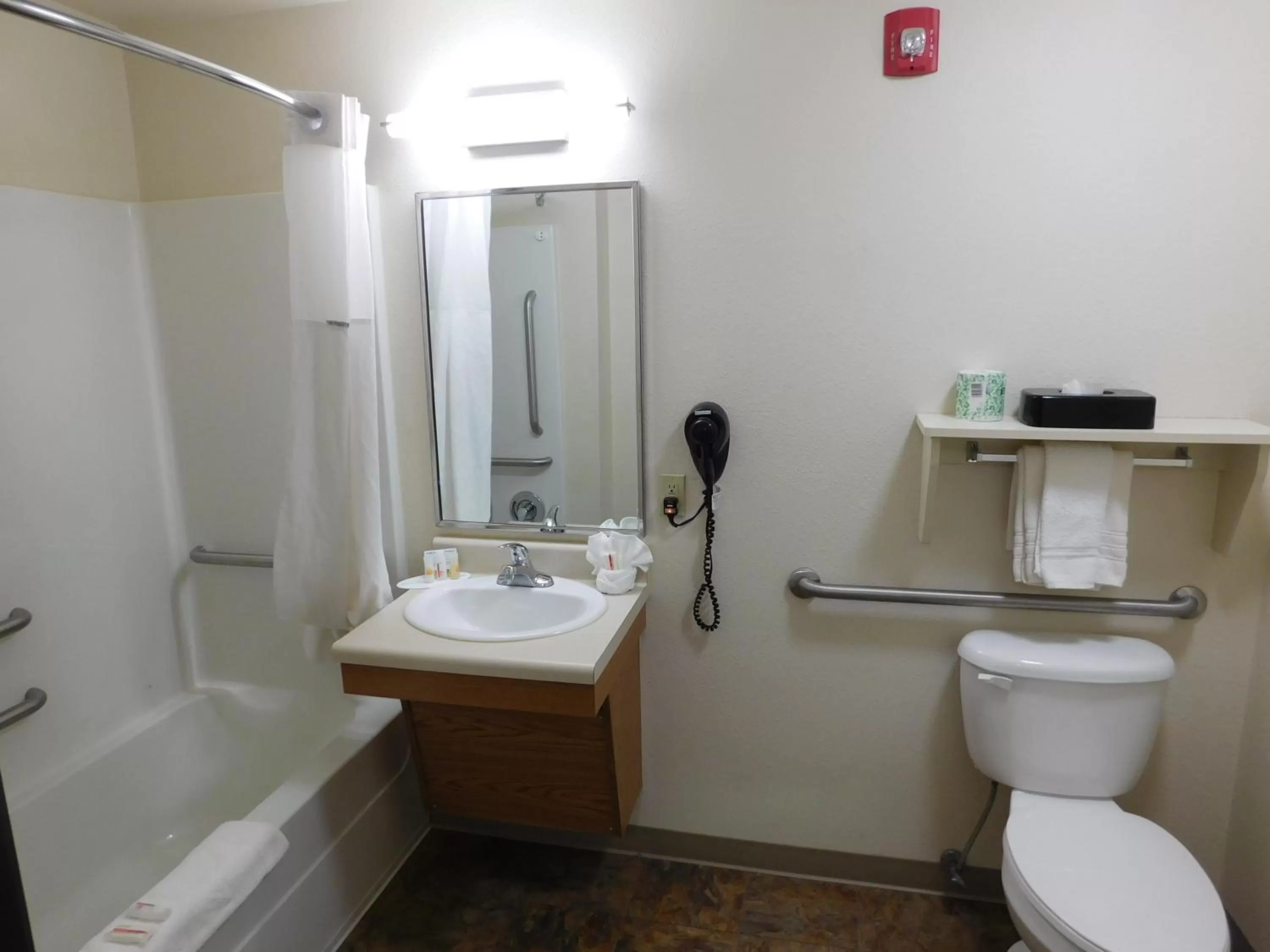 Bathroom in Days Inn & Suites by Wyndham Rochester South