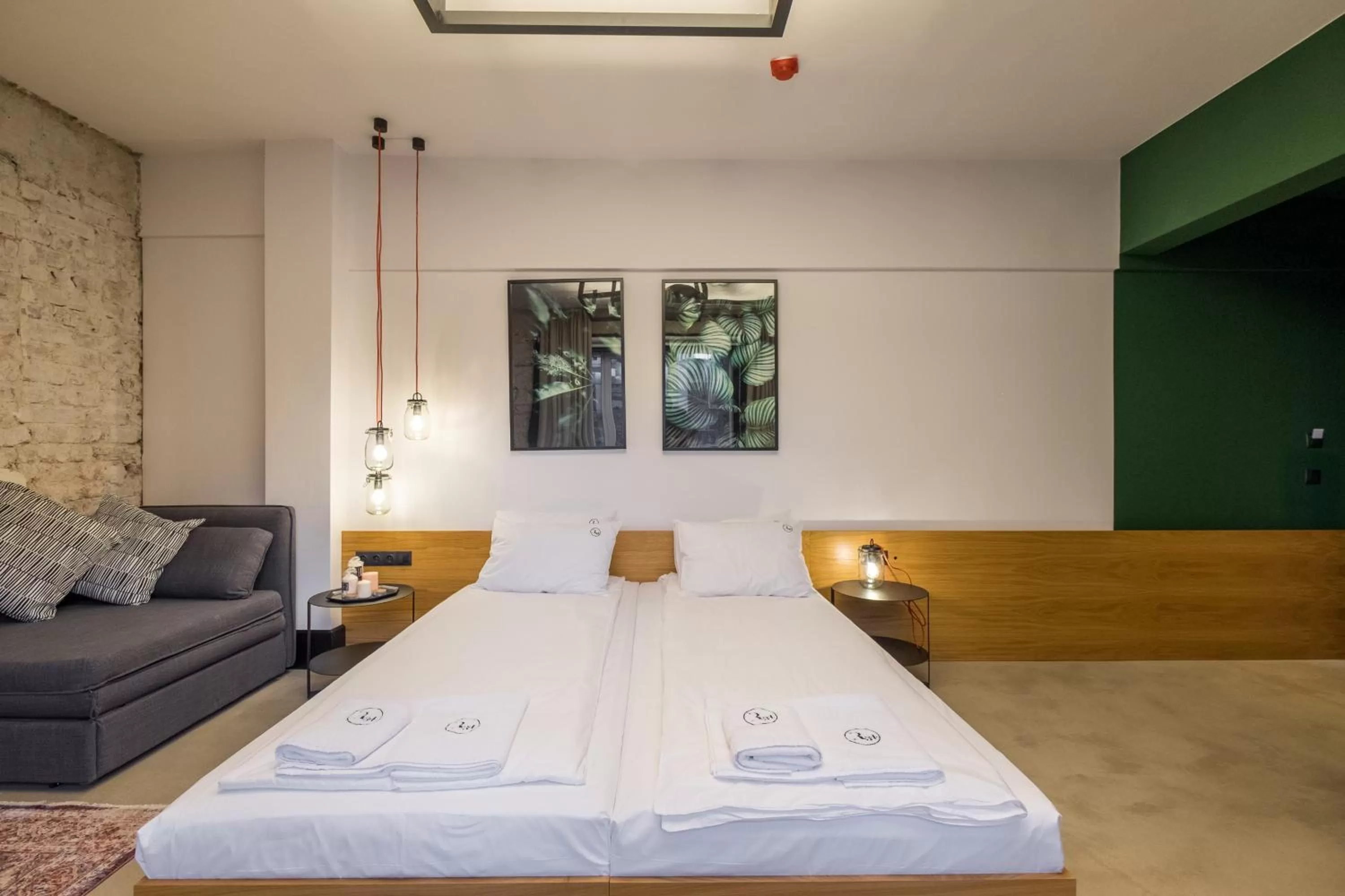 Bed in R34 Boutique Hotel