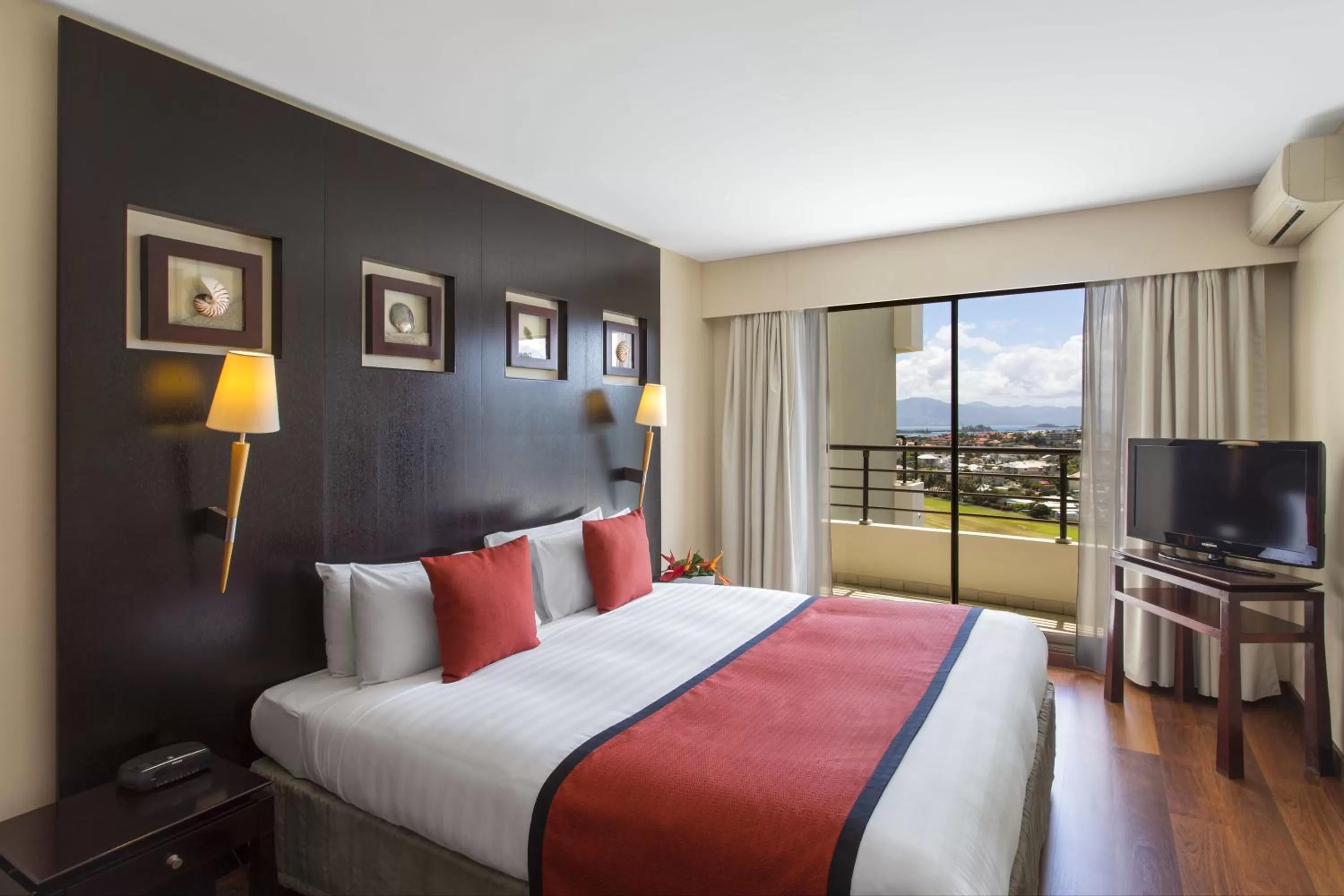 Bed in Ramada Hotel & Suites by Wyndham Noumea