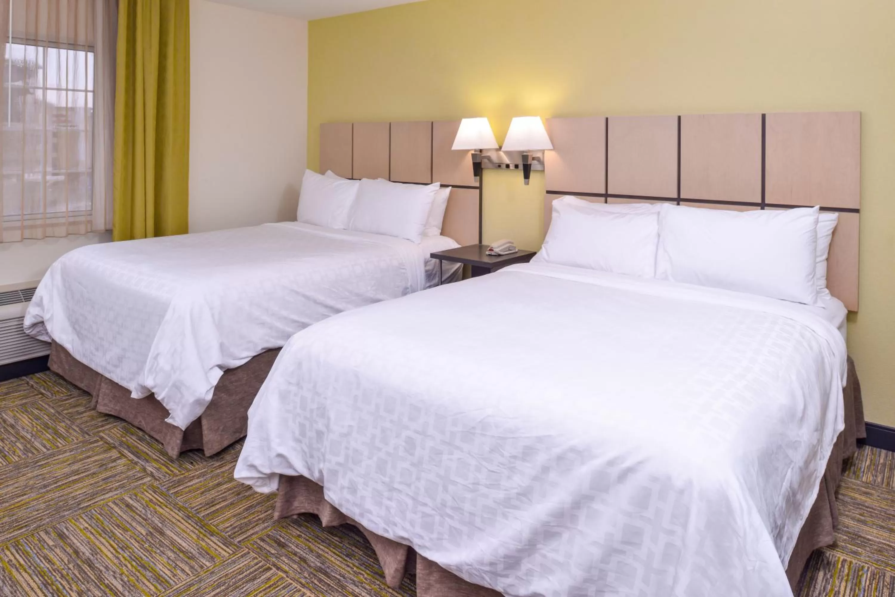 Bed in Candlewood Suites Paducah by IHG