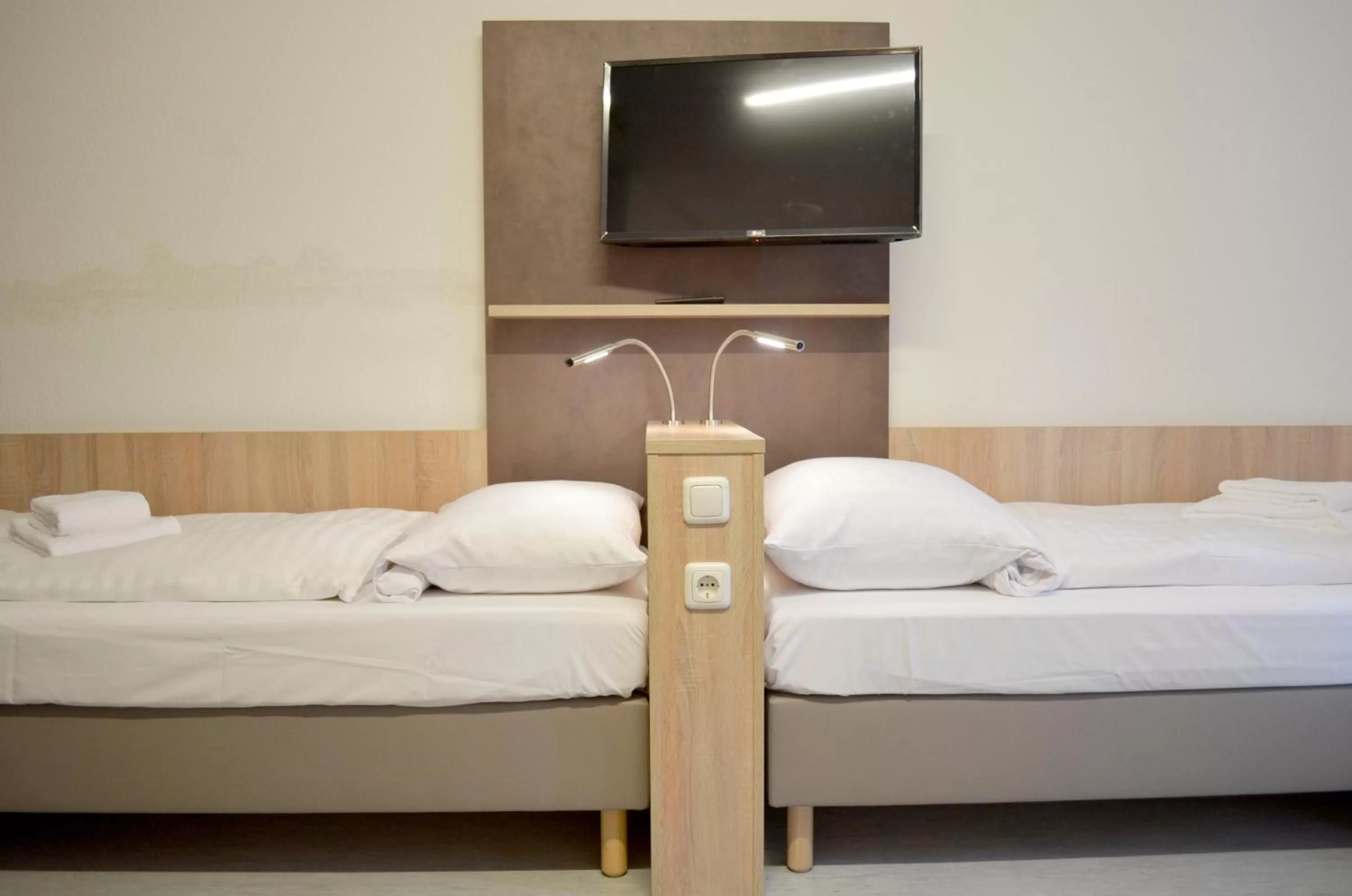 Bed in Hana Aparthotel