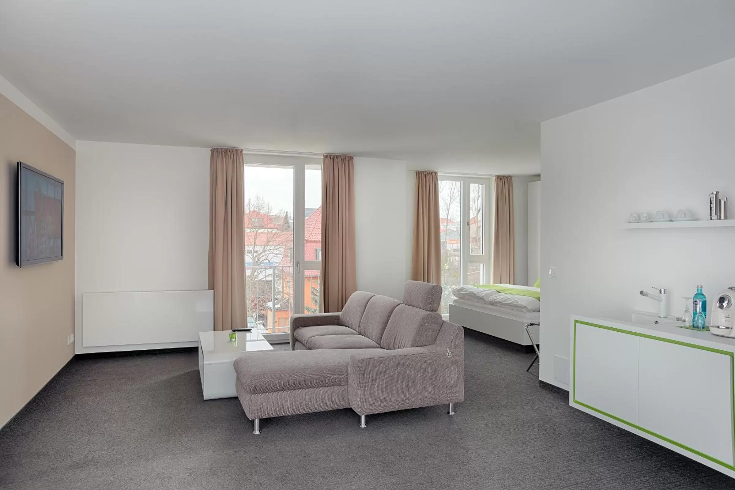 Living room, Bed in MARA Hotel