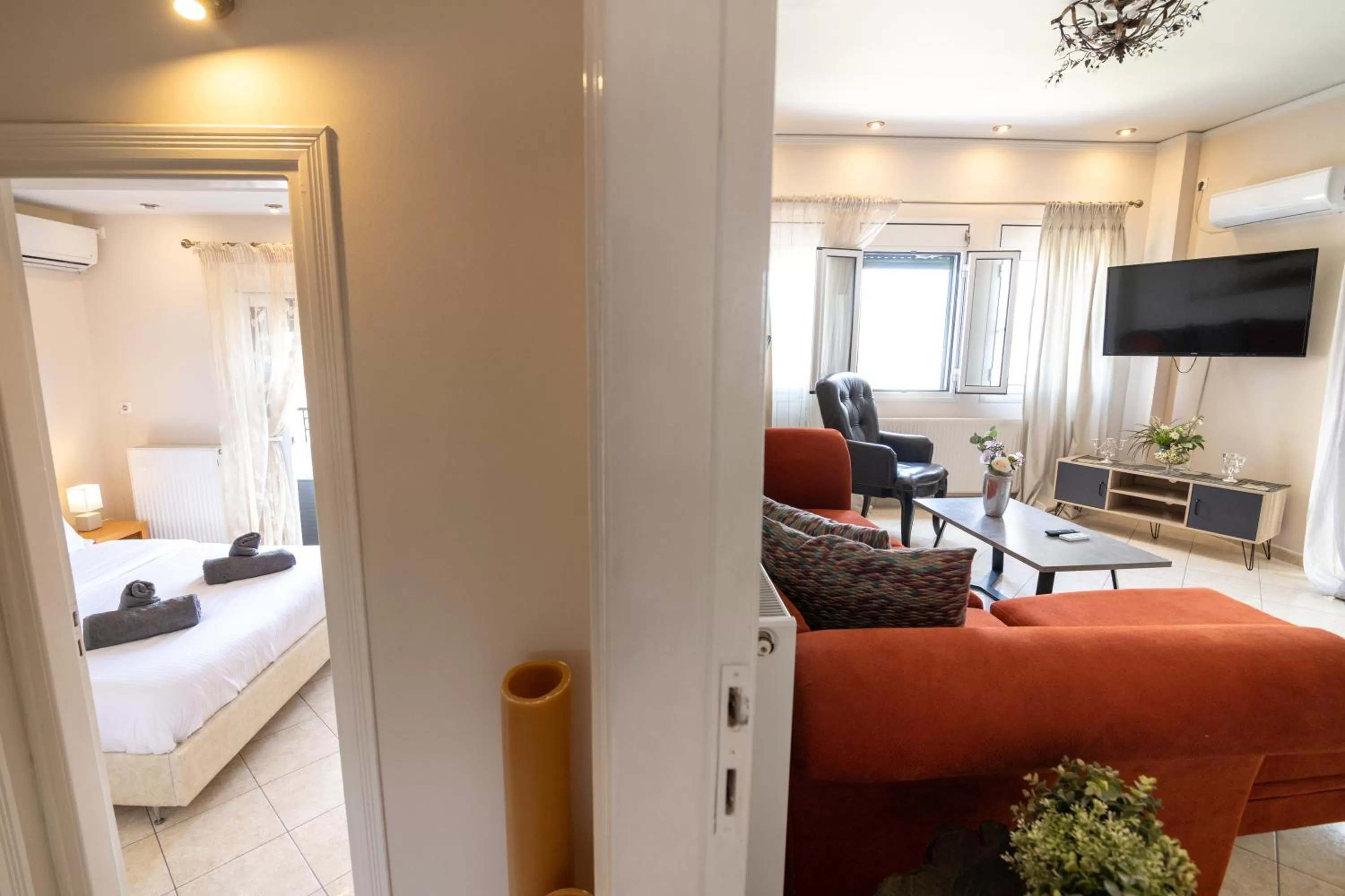 Seating area, Bed in Votsalakia Hotel & Luxury Apartments