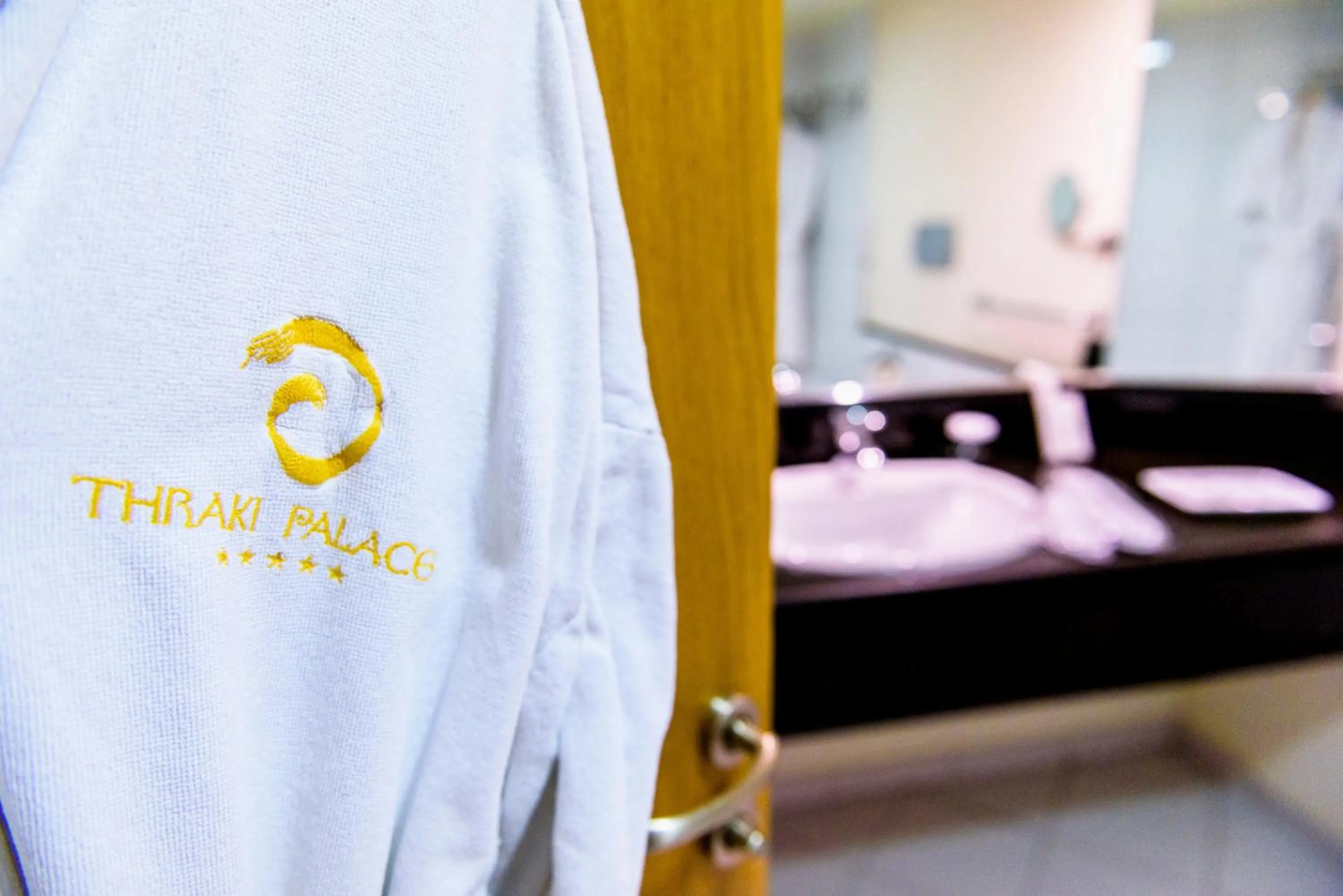 Bathroom, Bed in Ramada Plaza by Wyndham Thraki