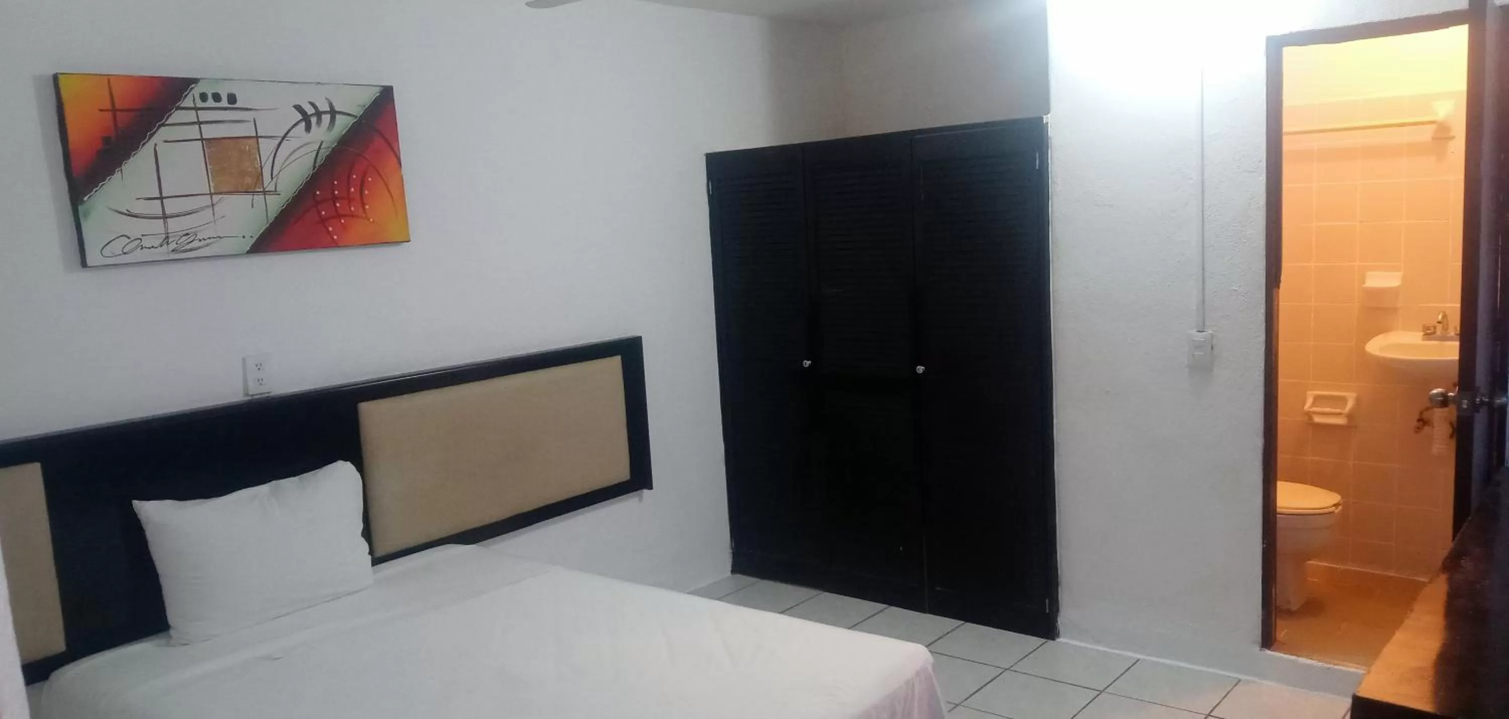 Bed in Hotel Blue Home Vallarta