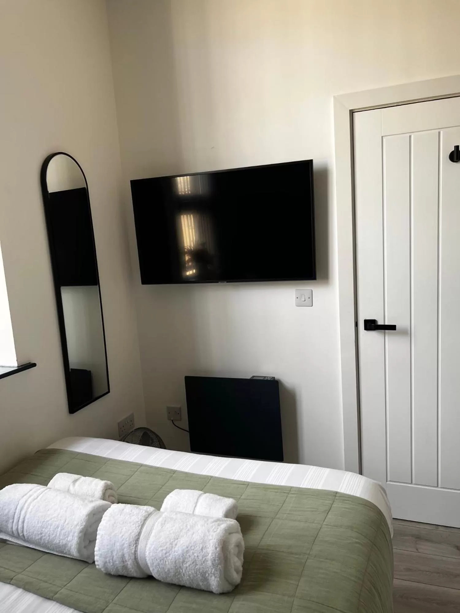 Bed in Spire Accommodations Ltd