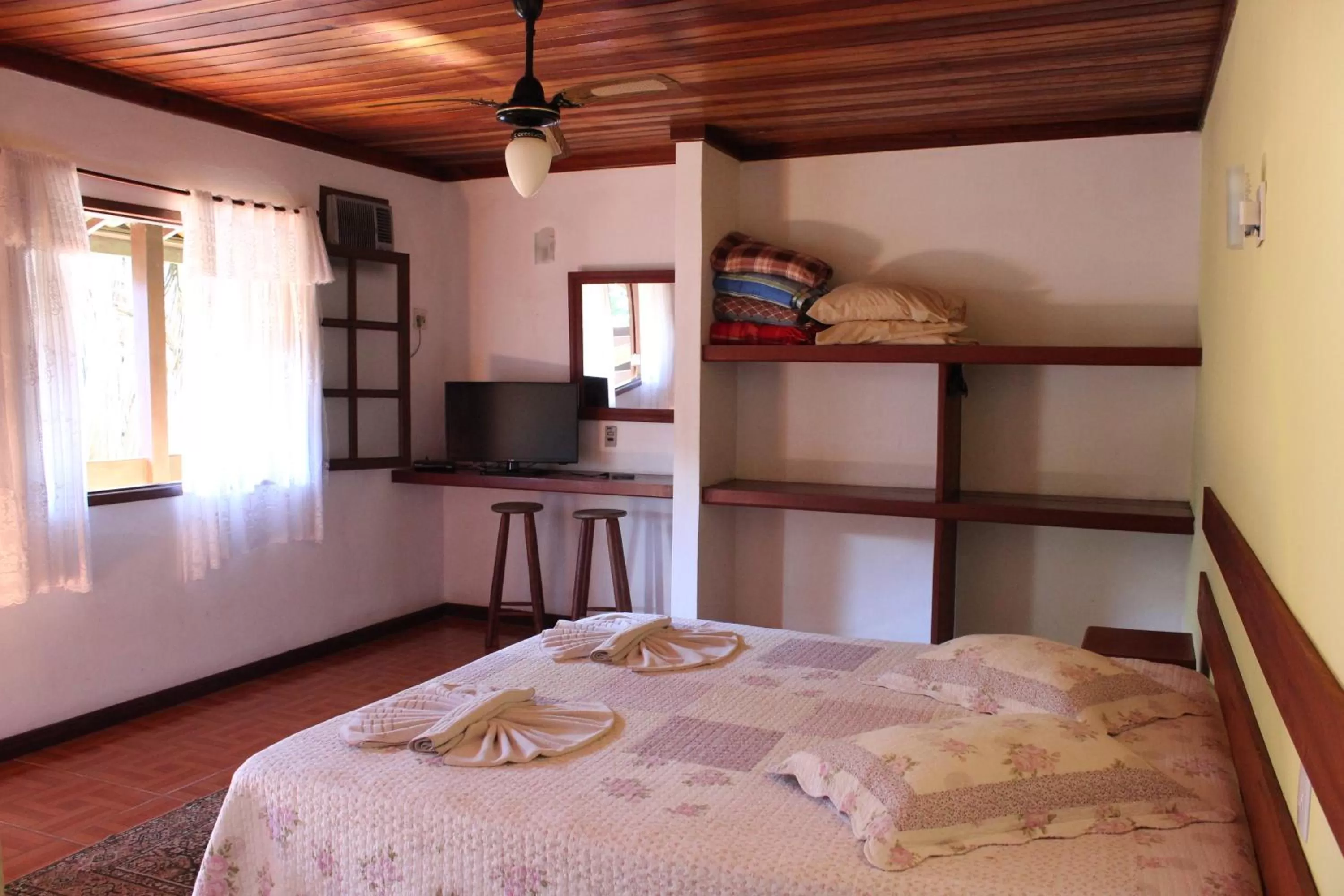 Bed in Pousada Flor de Paraty