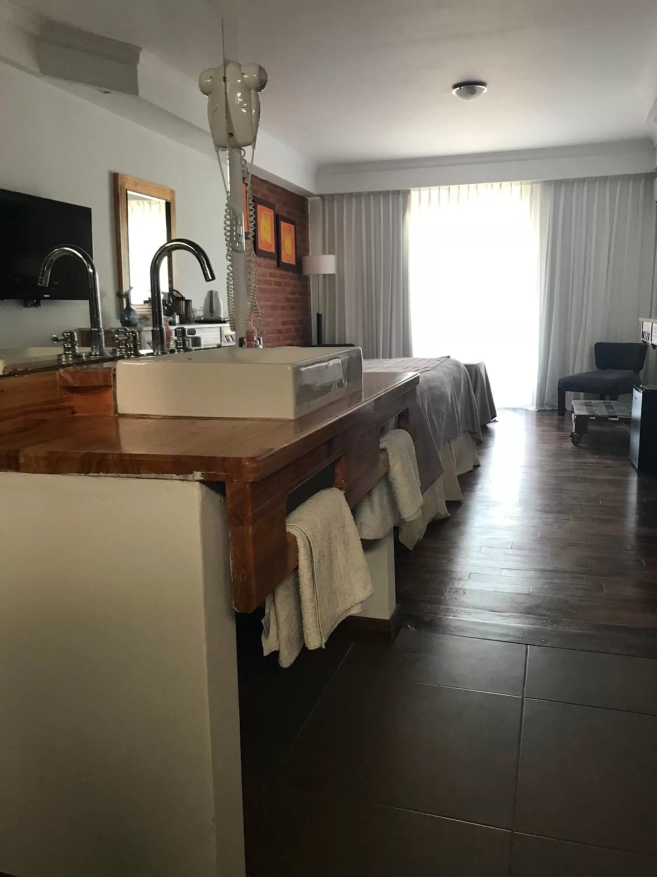 Kitchen/Kitchenette in Costanera Mar Hotel & Suites