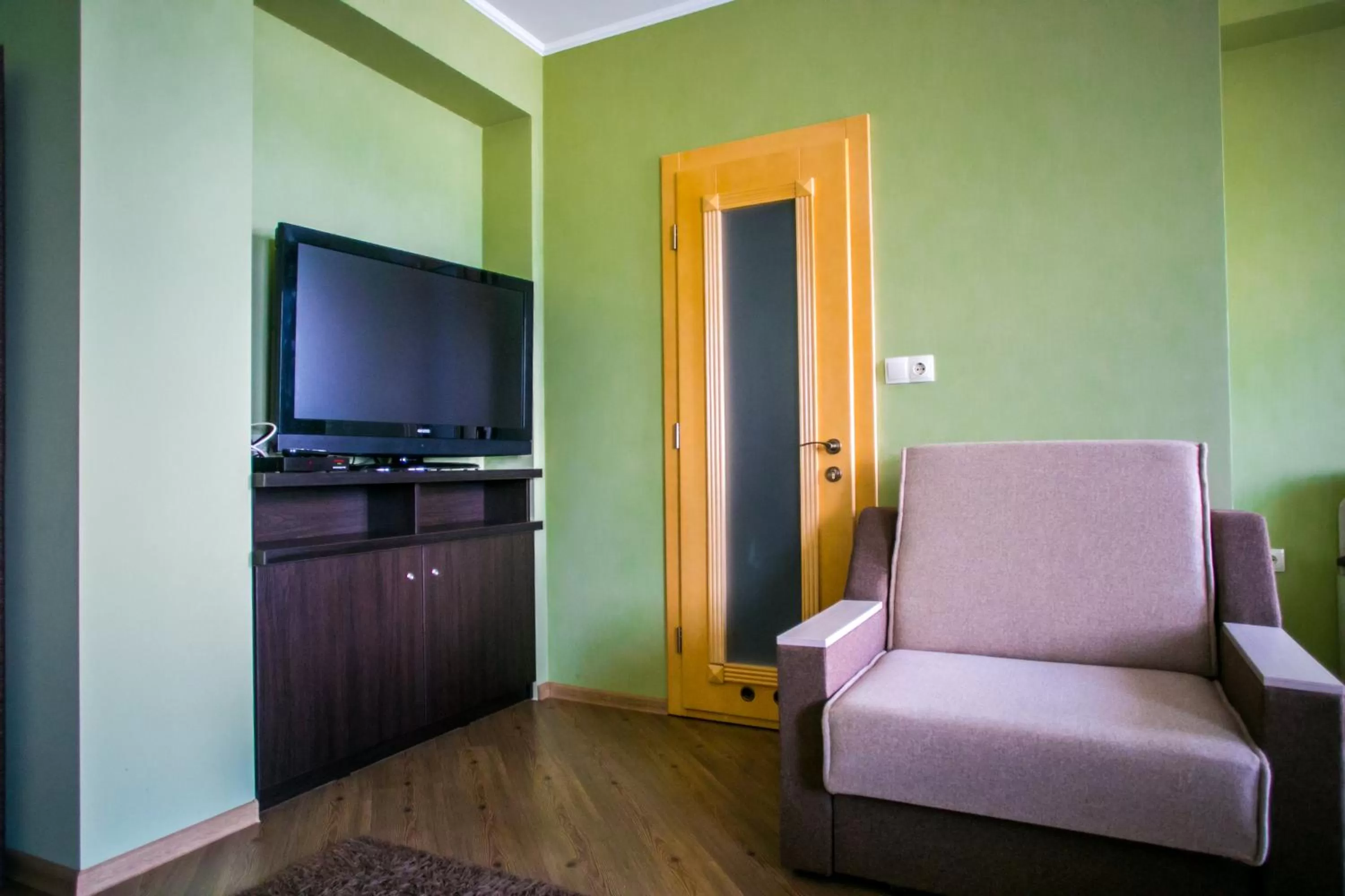 TV/Entertainment Center in Tulipan Hotel Aquapark