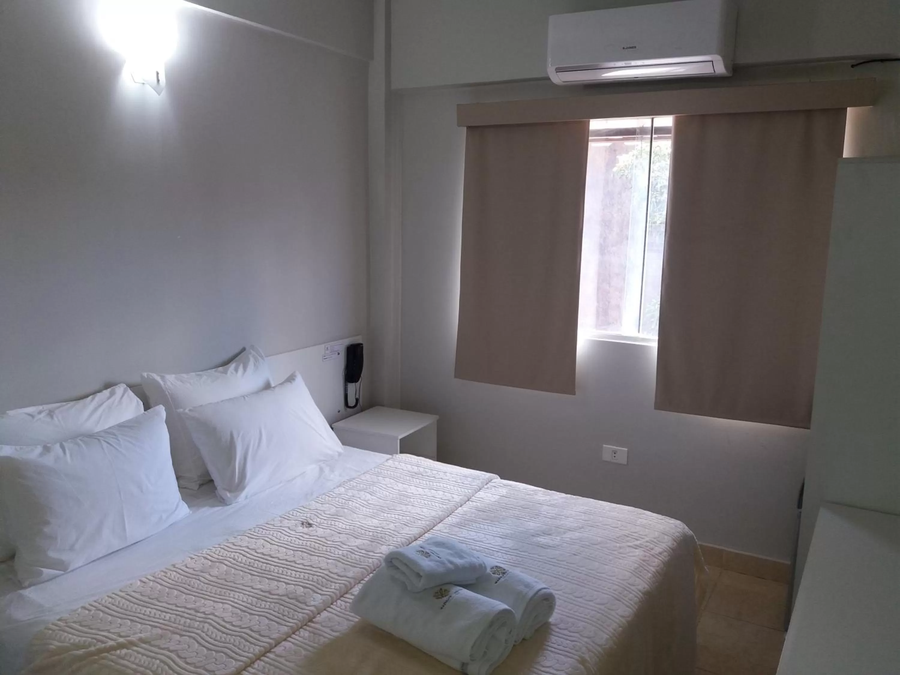 Bed in Madame Lynch Hotel Boutique