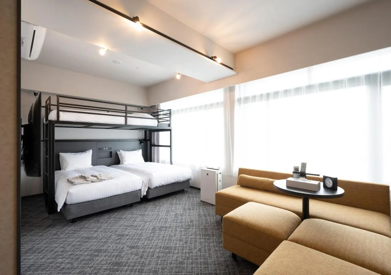 Photo of the whole room, Bed in Hotel Cocktail Stay Naha