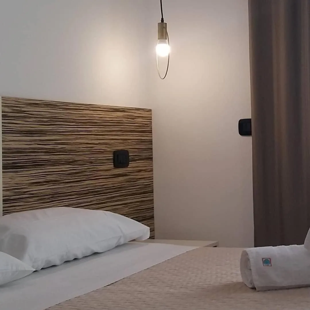 Bed in Albergo Milazzo Inn AiMori