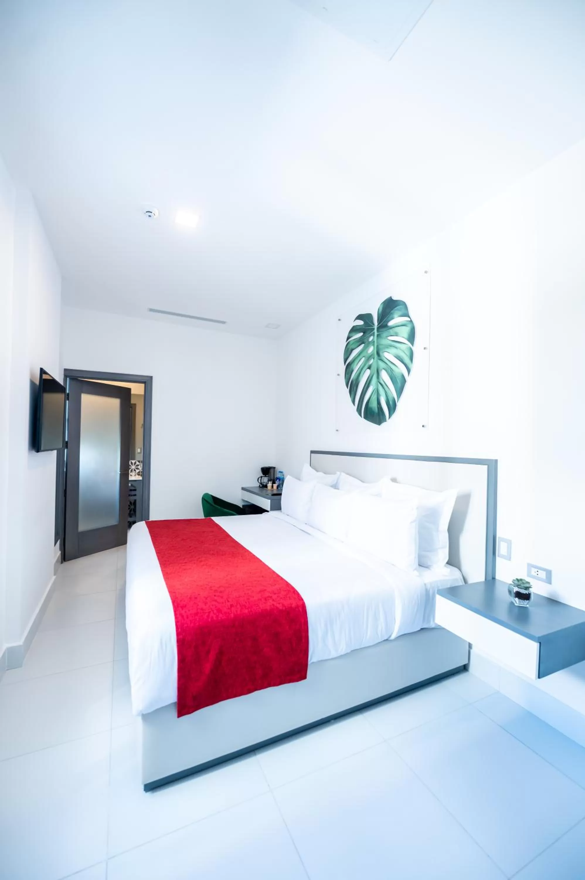 Bed in Gran Hotel Europa Santo Domingo Trademark Collection by Wyndham