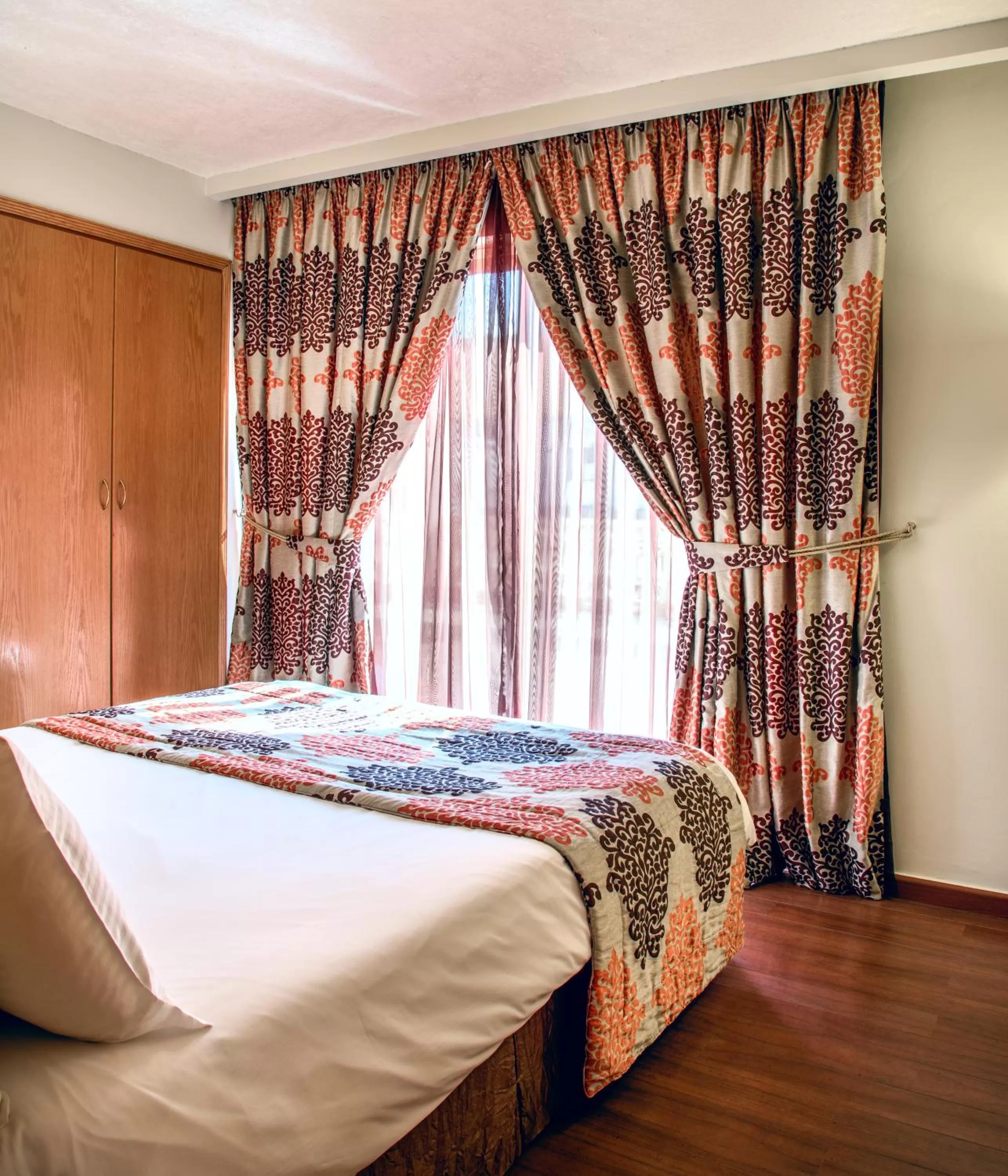 Bed in Bella Riva Hotel