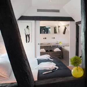 Photo of the whole room, Bed in Hôtel Quatorze