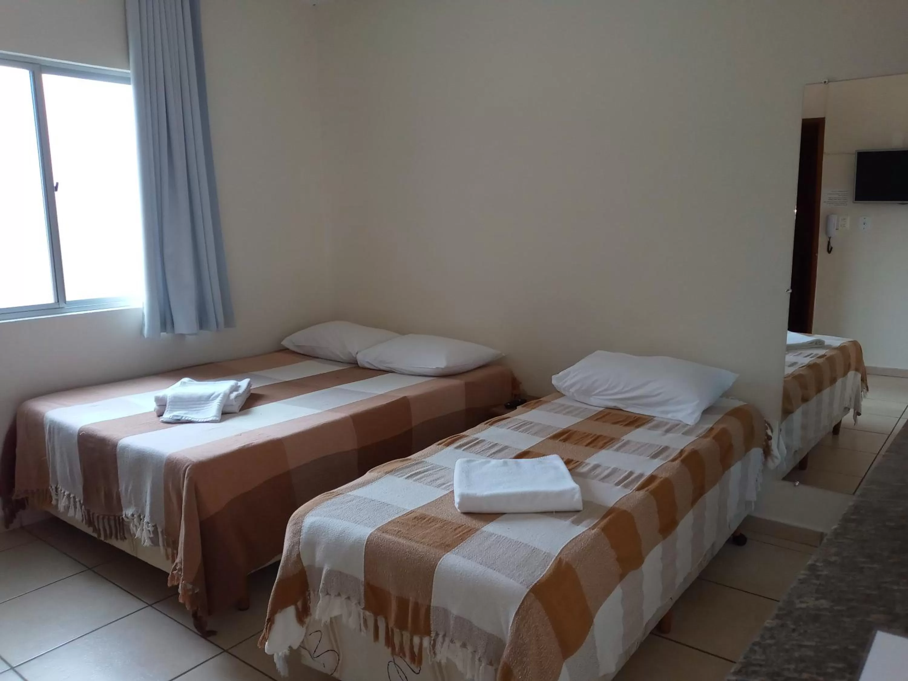 Bed in Pousada Vila Real Flats