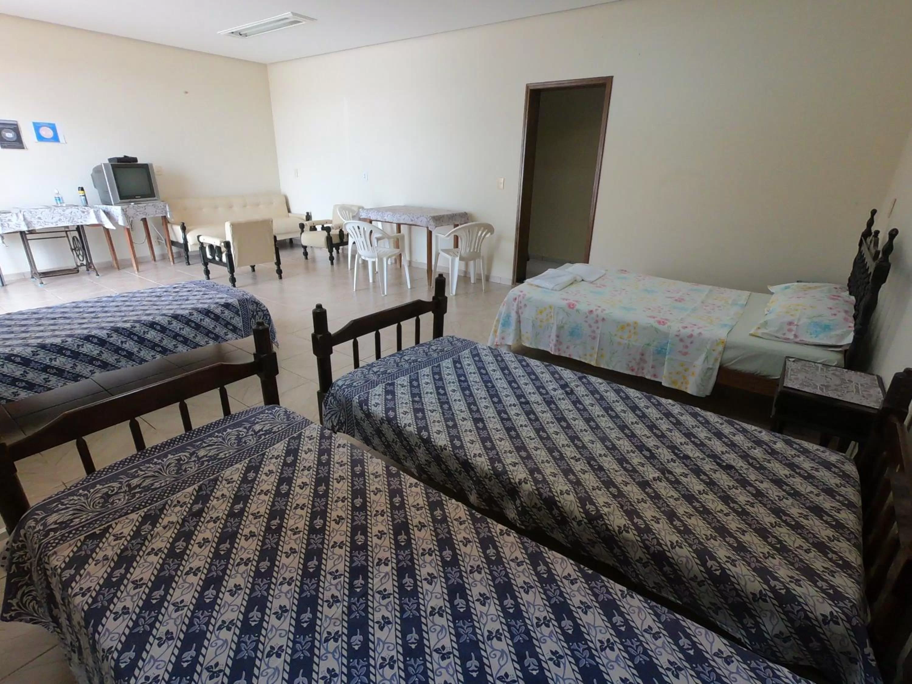 Photo of the whole room, Bed in Suíte na Canastra