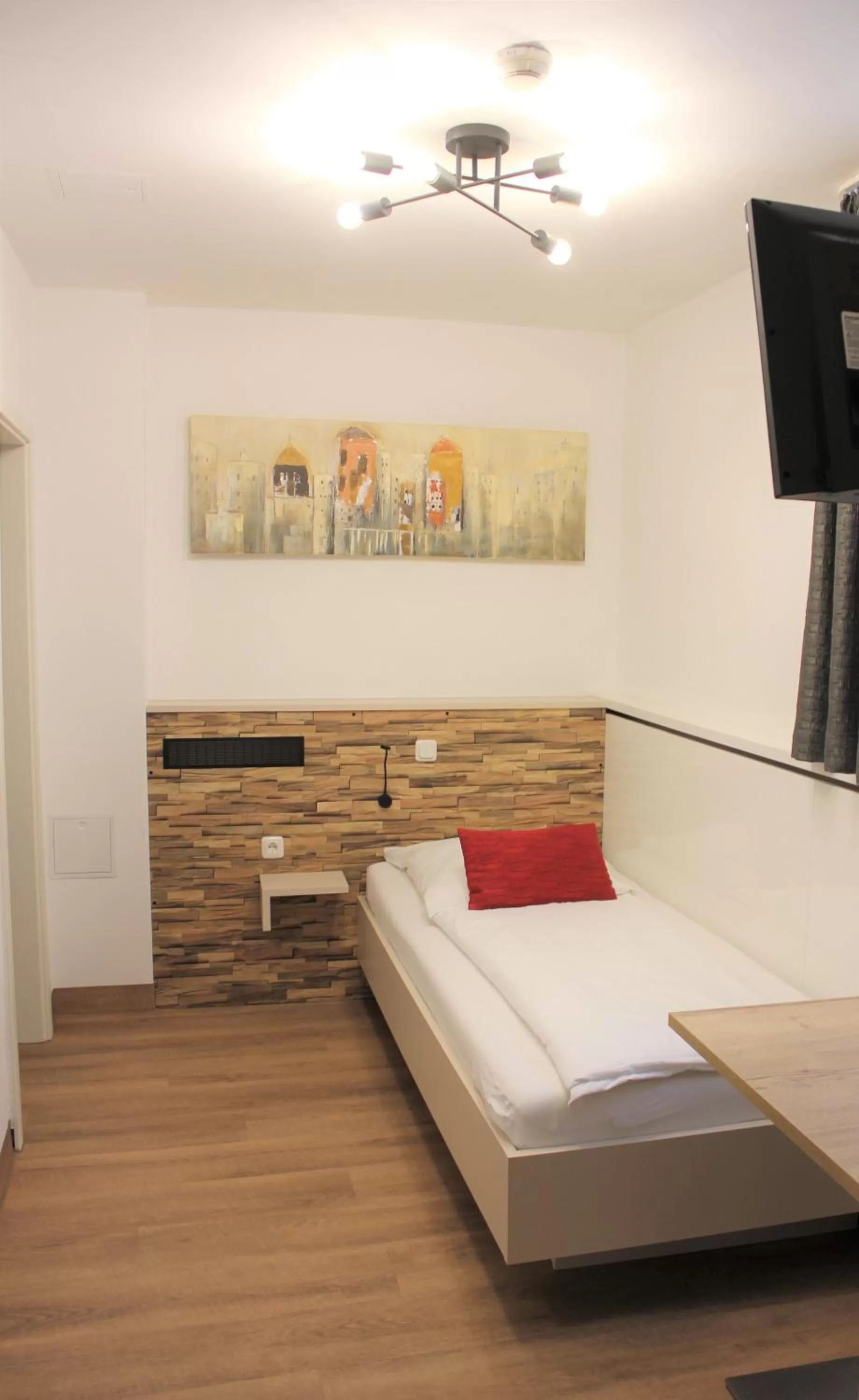 Photo of the whole room, Bed in Am Blumenhaus