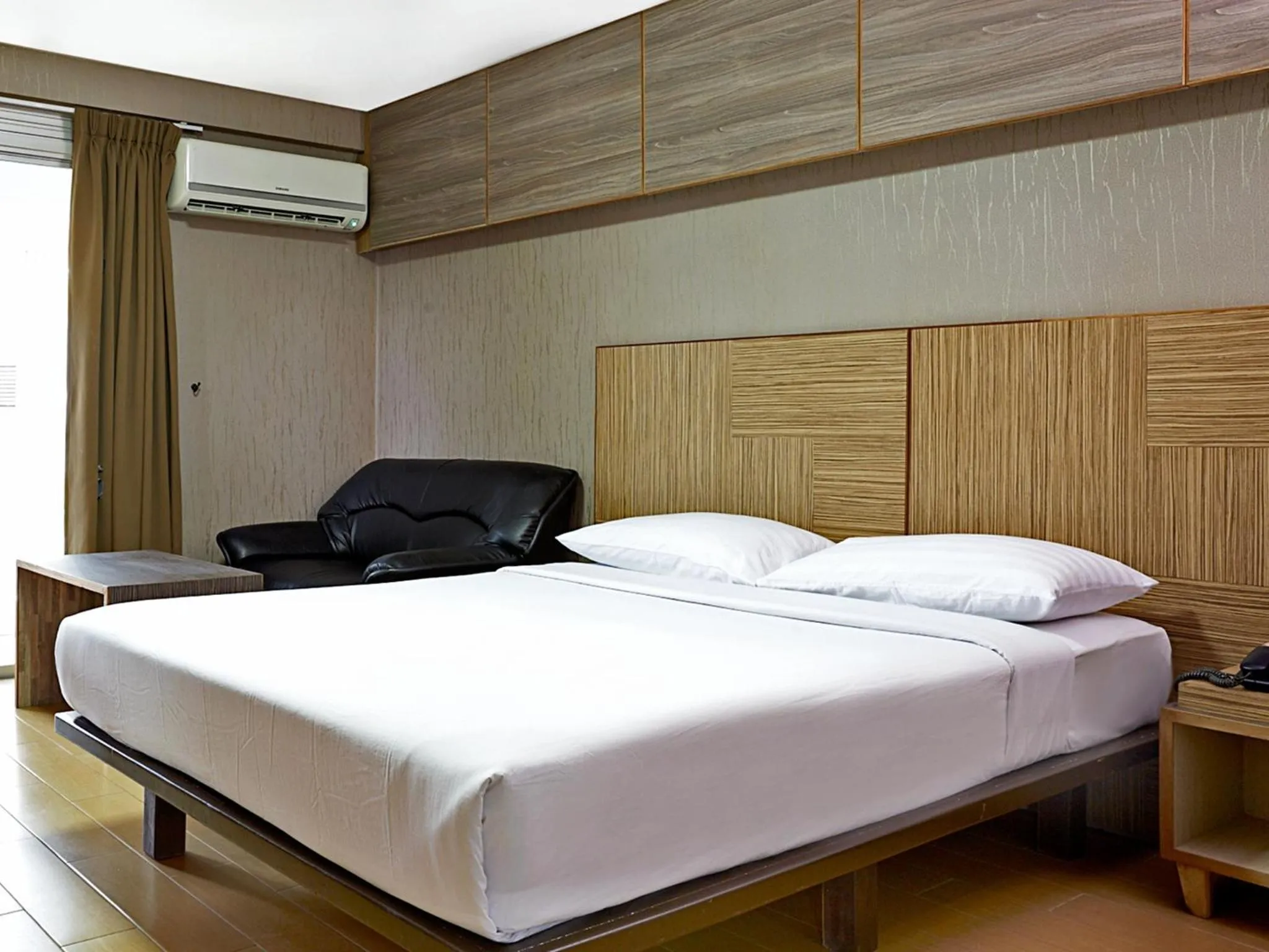Bed in Watana Hotel