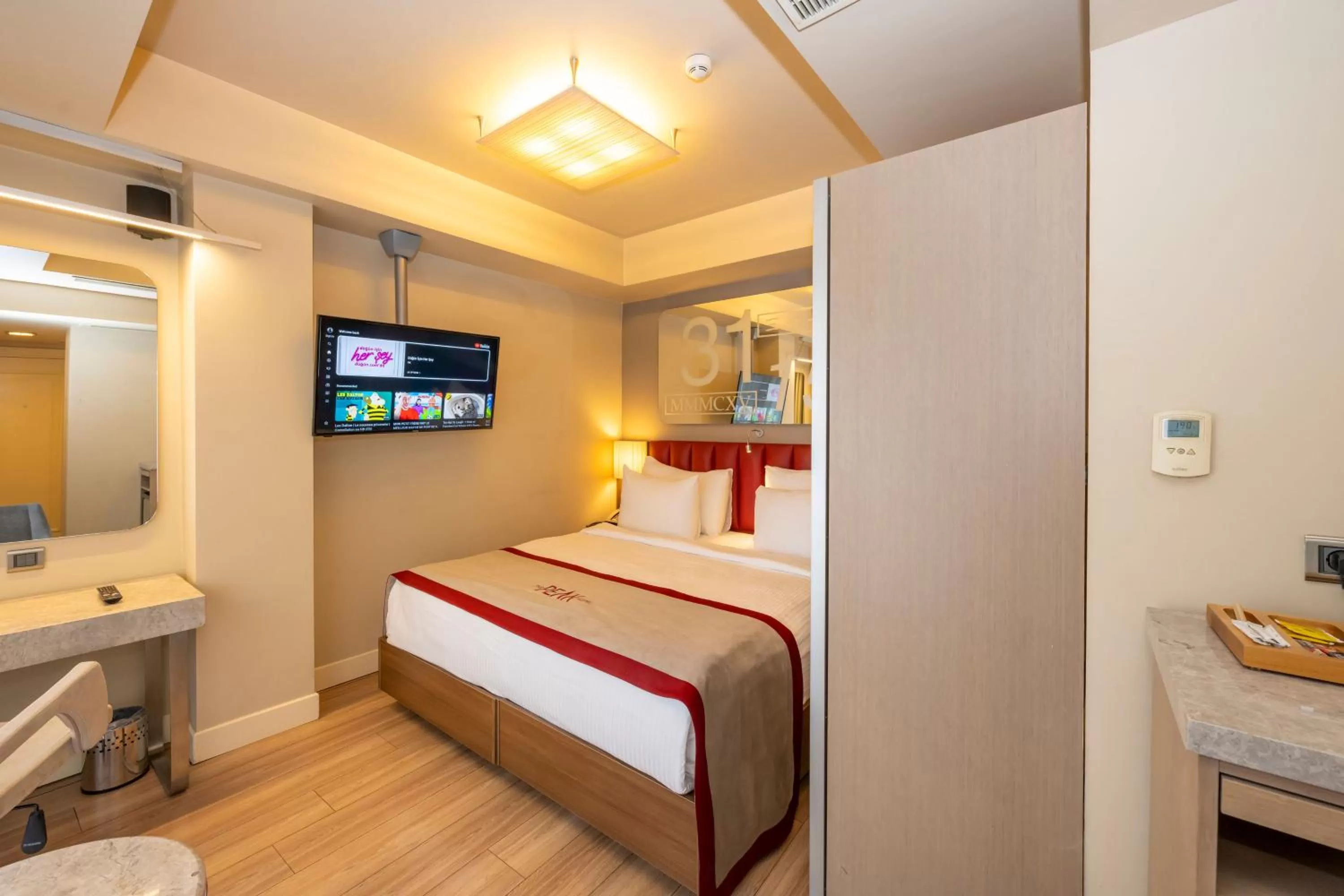 Kitchen or kitchenette, Bed in Ramada By Wyndham Istanbul Pera Taksim