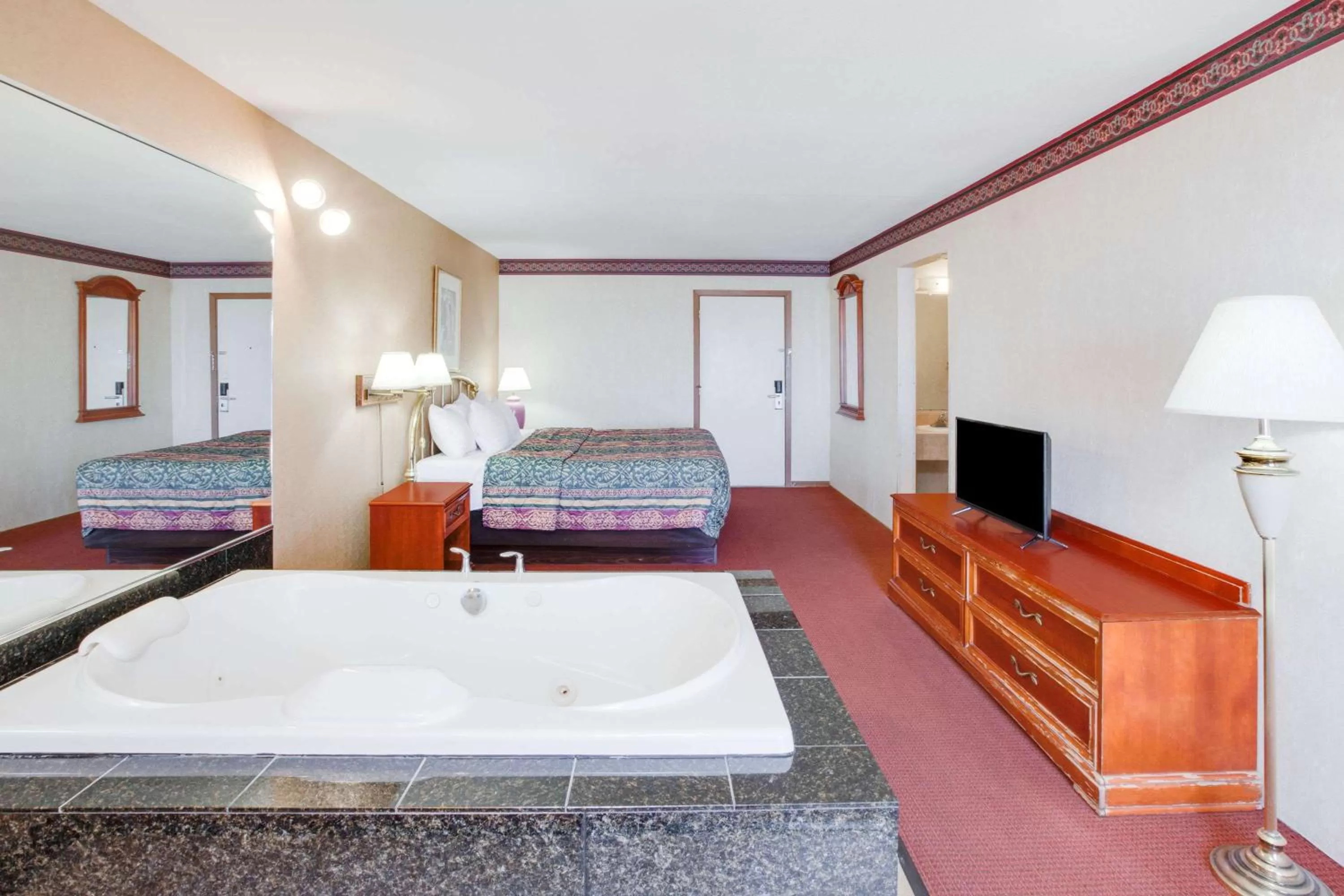 Photo of the whole room in Super 8 Beachfront by Wyndham Mackinaw City, MI