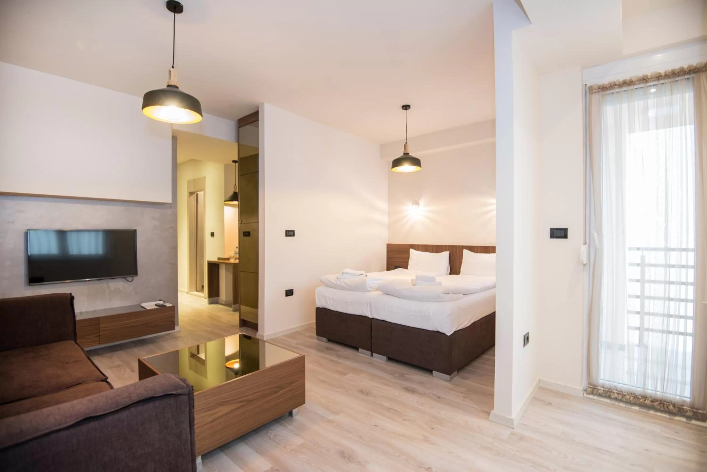 Seating area, Bed in Hotel Vlaho